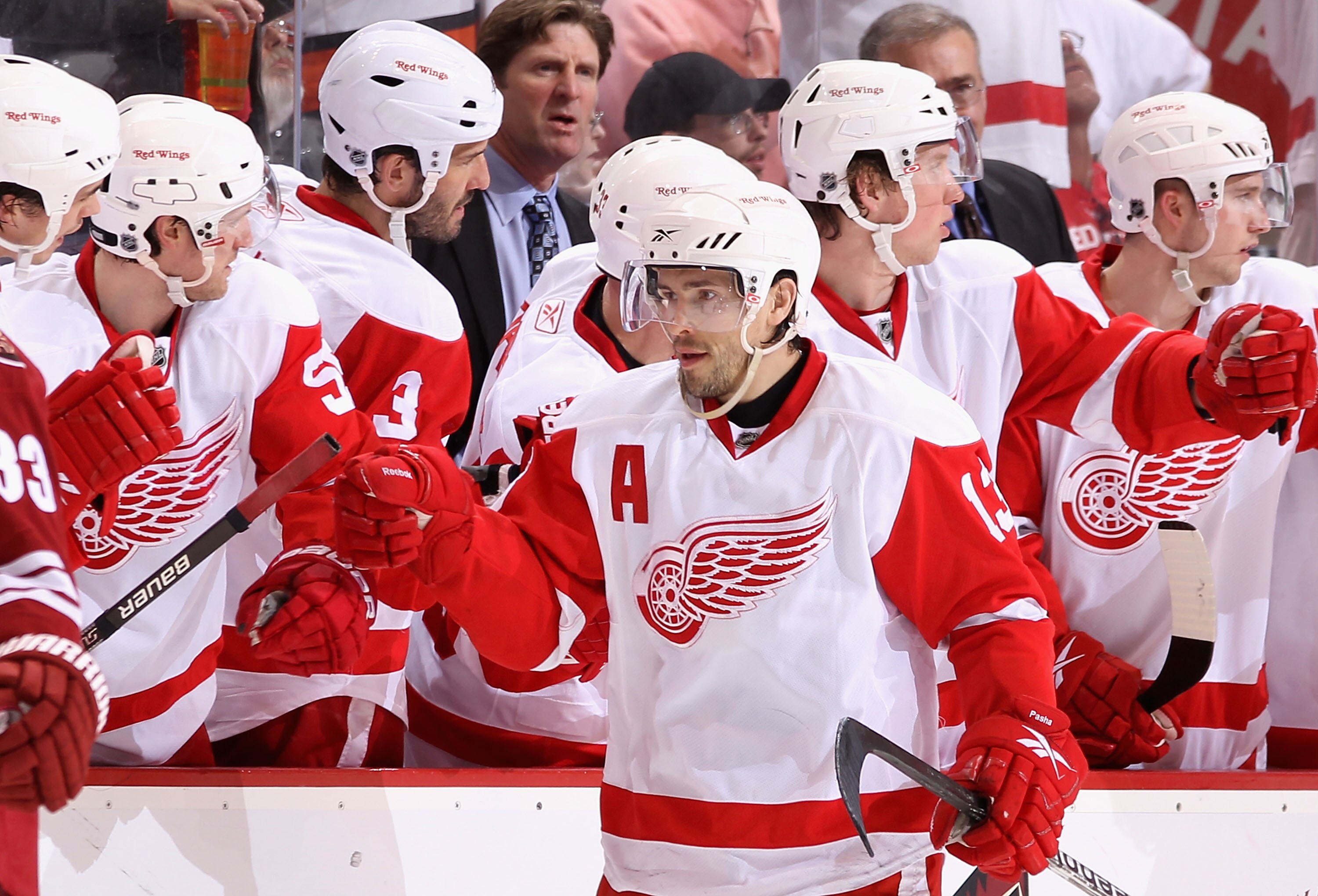 GLENDALE, AZ - APRIL 16:  Pavel Datsyuk #13 of the Detroit Red Wings celebrates with teammates on the bench after scoring a second period goal against the Phoenix Coyotes in Game Two of the Western Conference Quarterfinals during the 2010 NHL Stanley Cup