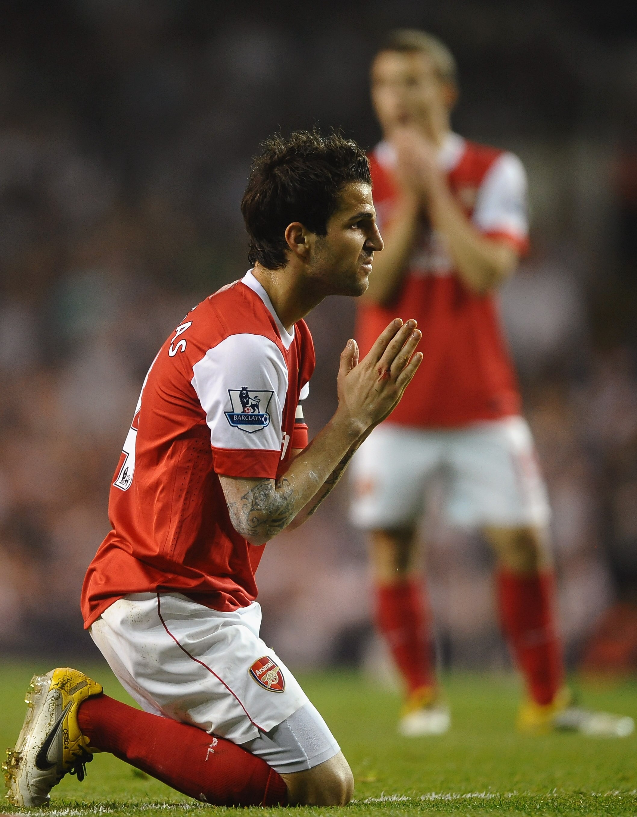 LONDON, ENGLAND - APRIL 20:  Cesc Fabregas of Arsenal reacts during the Barclays Premier League match between Tottenham Hotspur and Arsenal at White Hart Lane on April 20, 2011 in London, England.  (Photo by Laurence Griffiths/Getty Images)