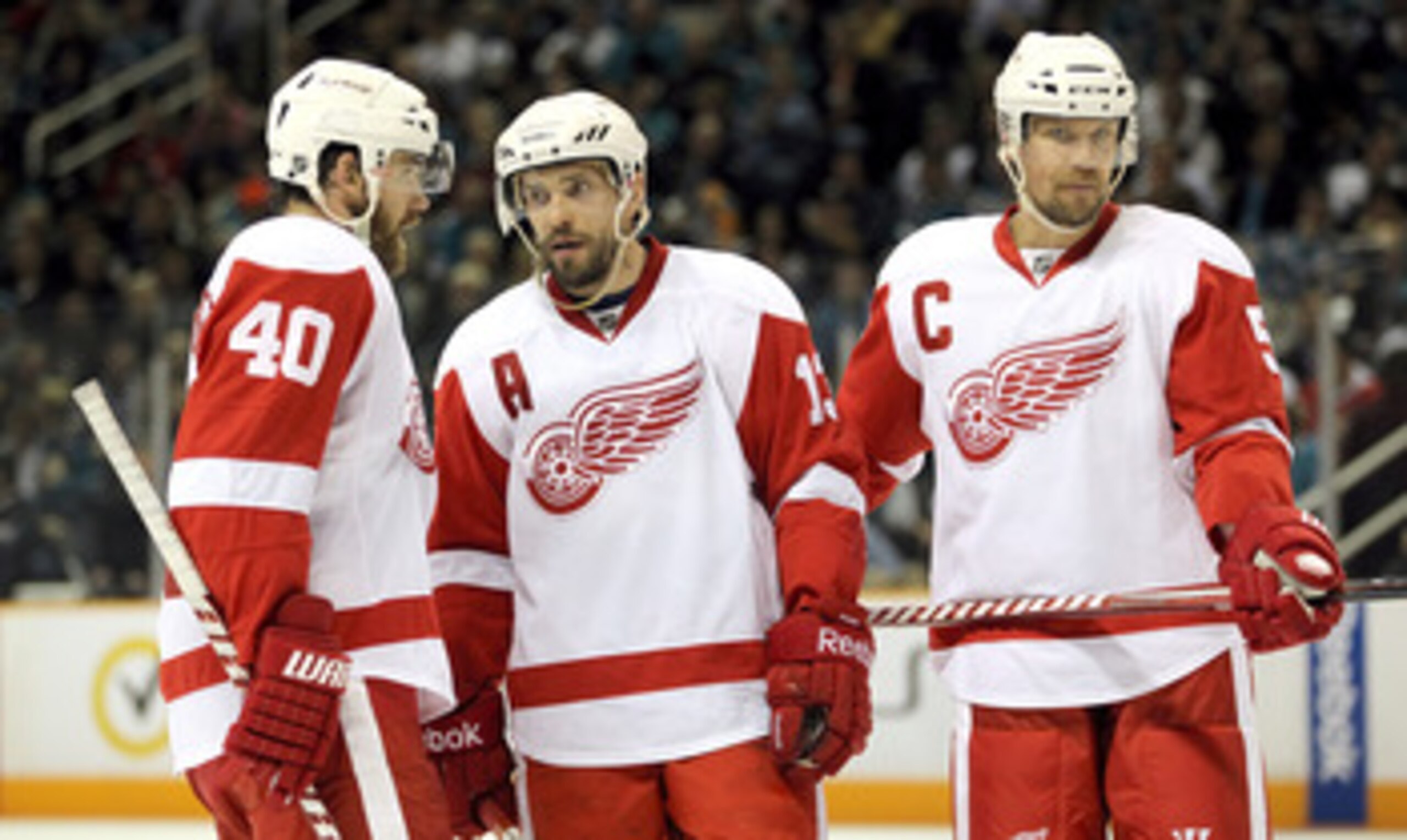 SAN JOSE, CA - MAY 12:  Henrik Zetterberg #40, Pavel Datsyuk #13, and Nicklas Lidstrom #5 of the Detroit Red Wings talk to each other before a face off against the San Jose Sharks in Game Seven of the Western Conference Semifinals during the 2011 NHL Stan