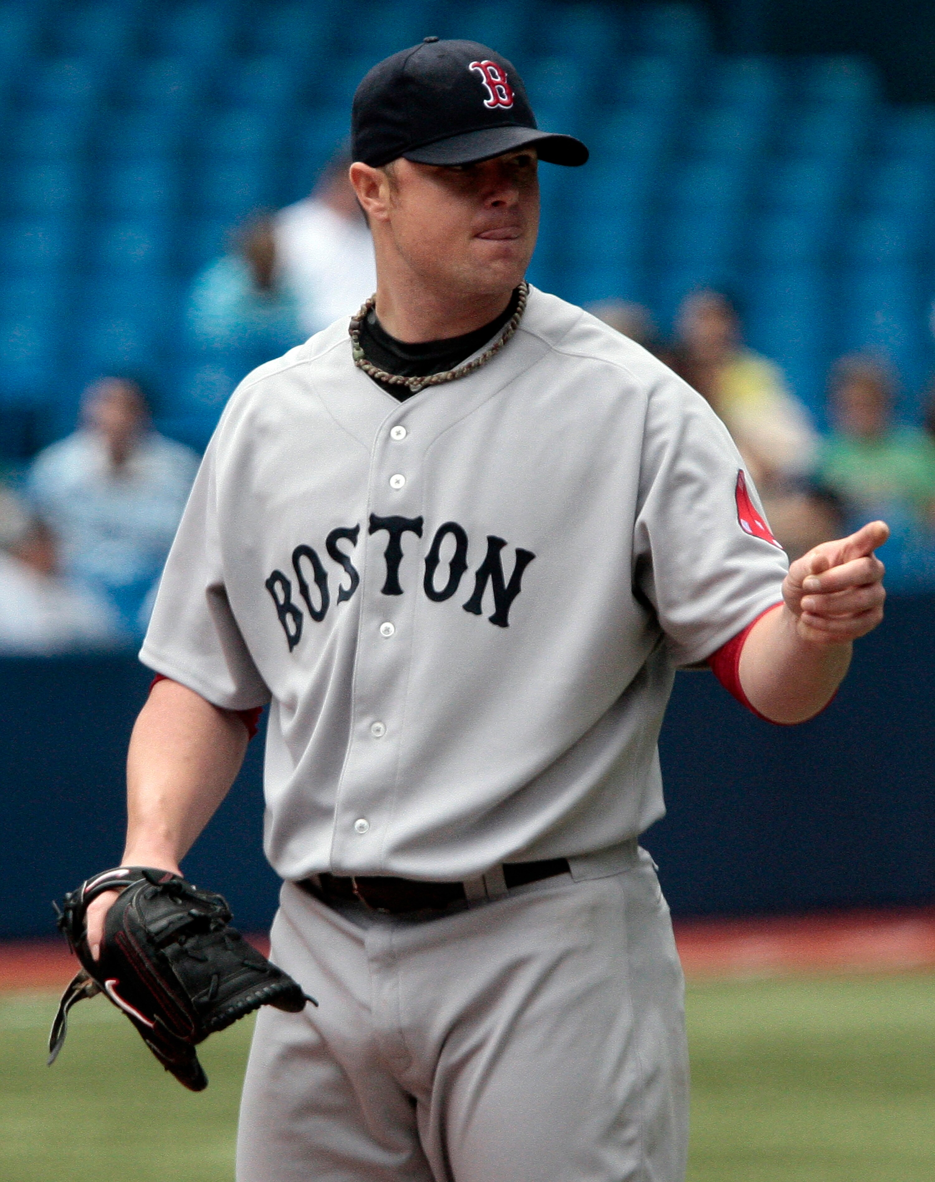 TORONTO, CANADA - JUNE 12: Jon Lester #31 of the Boston Red Sox celebrates an out against the Toronto Blue Jays during MLB action at The Rogers Centre June 12, 2011 in Toronto, Ontario, Canada. (Photo by Abelimages/Getty Images)