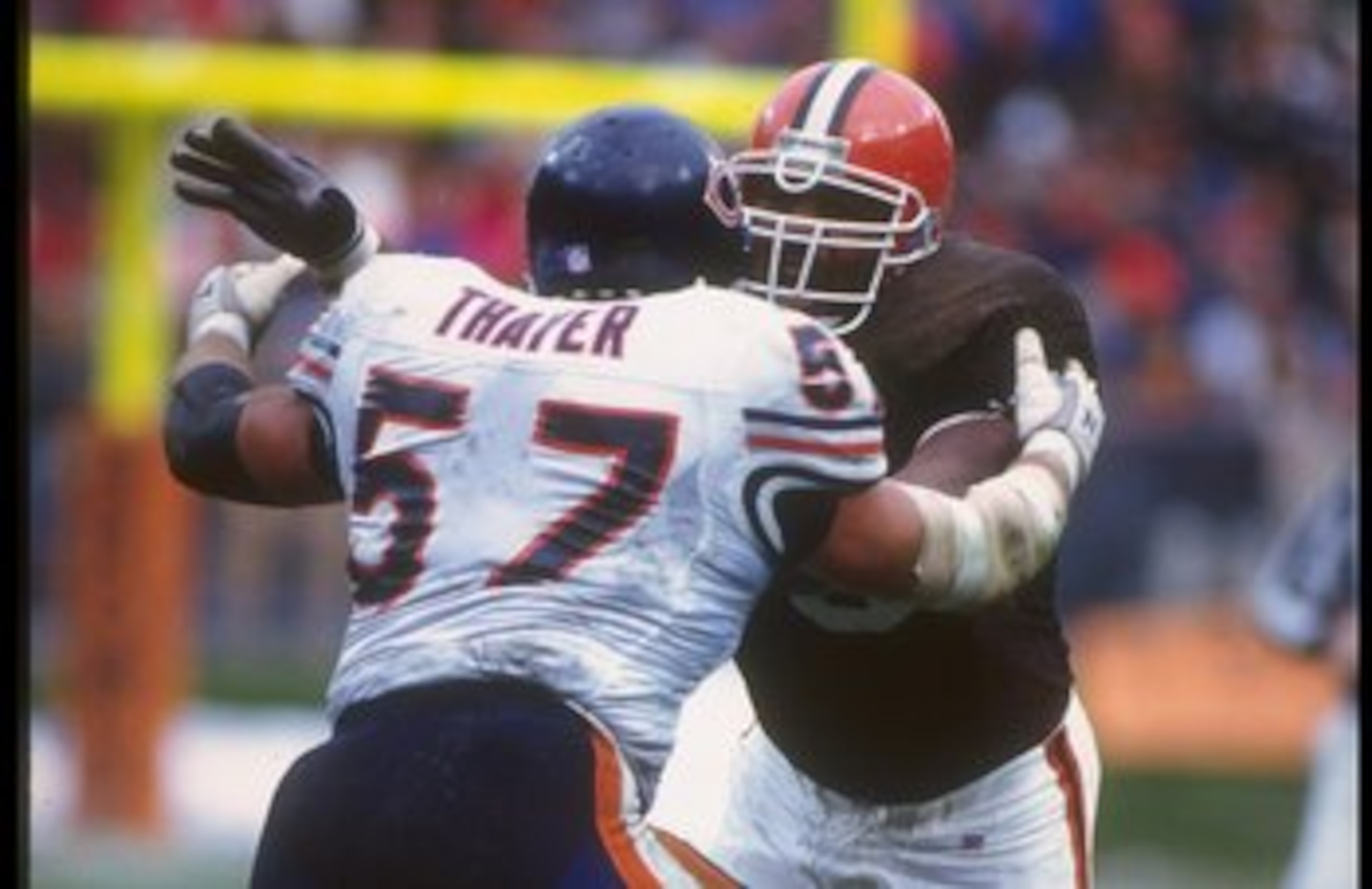 29 Nov 1992: Defensive lineman Rob Burnett of the Cleveland Browns works against Chicago Bears offensive lineman Tom Thayer during a game at Soldier Field in Chicago, Illinois. The Browns won the game, 27-14. 29 Nov 1992: Defensive lineman Rob Burnett of the Cleveland Browns works against Chicago Bears offensive lineman Tom Thayer during a game at Soldier Field in Chicago, Illinois. The Browns won the game, 27-14.