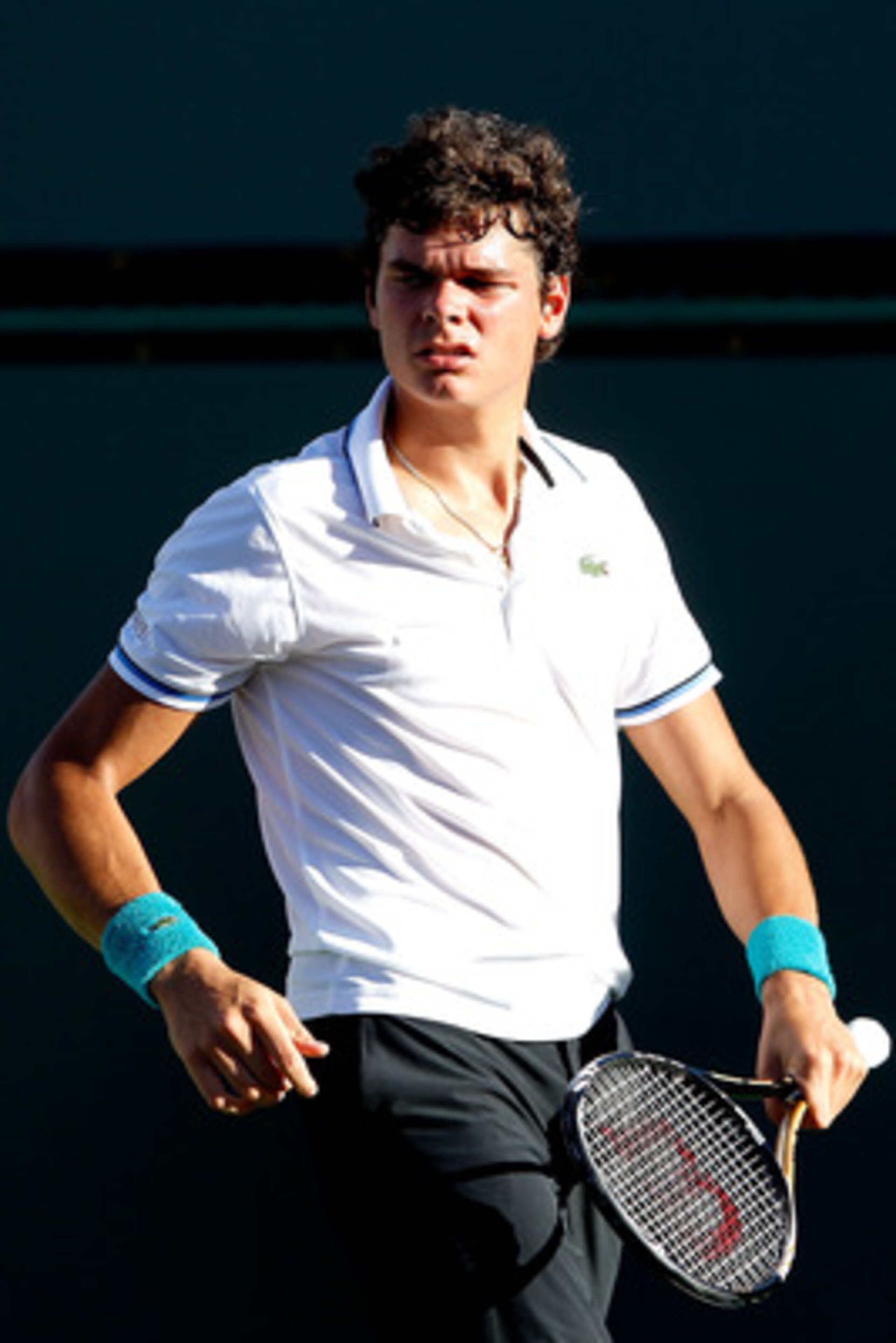INDIAN WELLS, CA - MARCH 15: Milos Raonic of Canada plays Ryan Harrison during the BNP Paribas Open at the Indian Wells Tennis Garden on March 15, 2011 in Indian Wells, California. (Photo by Matthew Stockman/Getty Images) INDIAN WELLS, CA - MARCH 15: Milos Raonic of Canada plays Ryan Harrison during the BNP Paribas Open at the Indian Wells Tennis Garden on March 15, 2011 in Indian Wells, California. (Photo by Matthew Stockman/Getty Images)