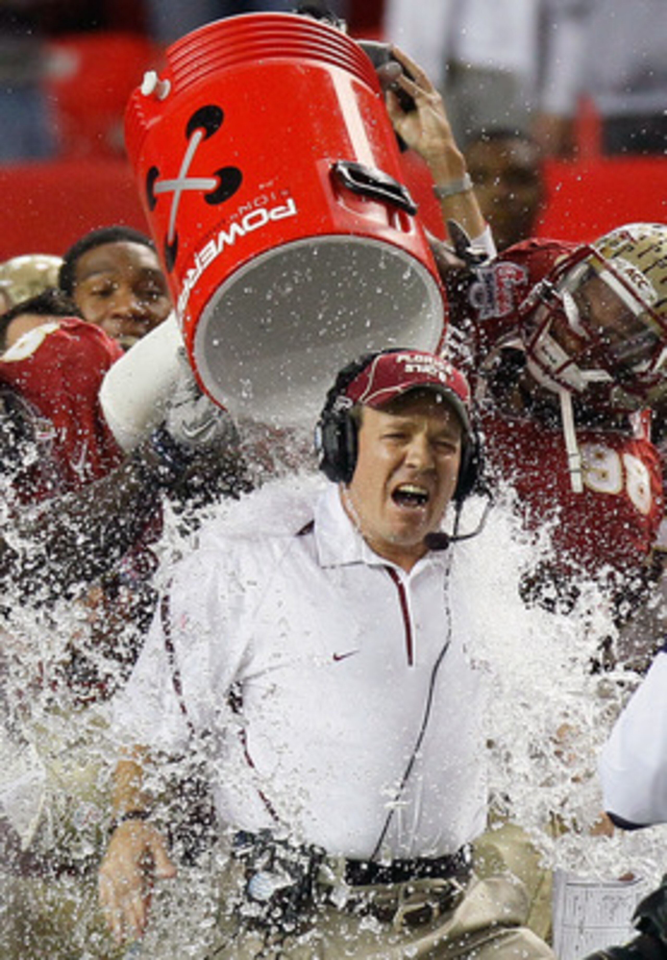 ATLANTA, GA - DECEMBER 31: Head coach JimboFisher of the Florida State Seminoles is doused with water in the final seconds of their 26-17 win over the South Carolina Gamecocks during the 2010 Chick-fil-A Bowl at Georgia Dome on December 31, 2010 in Atlan ATLANTA, GA - DECEMBER 31: Head coach JimboFisher of the Florida State Seminoles is doused with water in the final seconds of their 26-17 win over the South Carolina Gamecocks during the 2010 Chick-fil-A Bowl at Georgia Dome on December 31, 2010 in Atlan