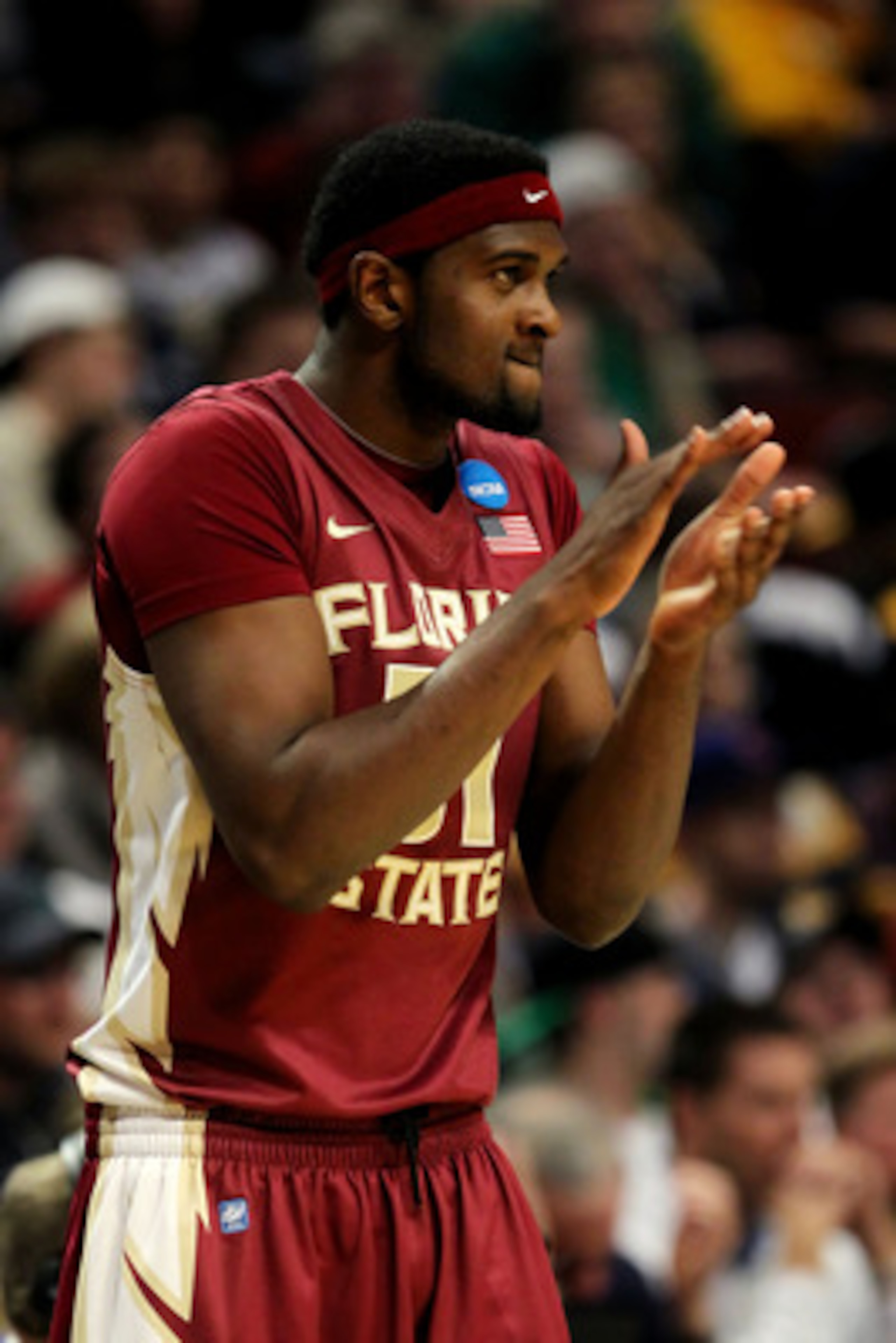 CHICAGO, IL - MARCH 20: Chris Singleton #31 of the Florida State Seminoles cheers for the team in the first half against the Notre Dame Fighting Irish during the third round of the 2011 NCAA men's basketball tournament at the United Center on March 20, 2 CHICAGO, IL - MARCH 20: Chris Singleton #31 of the Florida State Seminoles cheers for the team in the first half against the Notre Dame Fighting Irish during the third round of the 2011 NCAA men's basketball tournament at the United Center on March 20, 2