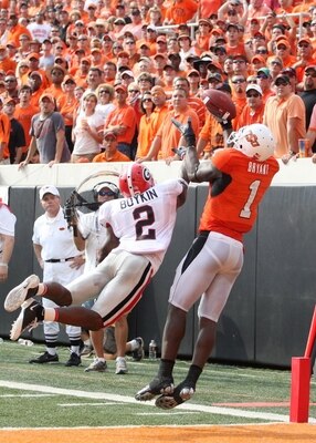 STILLWATER, OK - SEPTEMBER 5:  Runningback Brandon Boykin #2 of the Georgia Bulldogs dives for the ball for the ball as Dez Bryant #1 of the Oklahoma State Cowboys cannot make the pass during the third quarter of the game at Boone Pickens Stadium on Septe