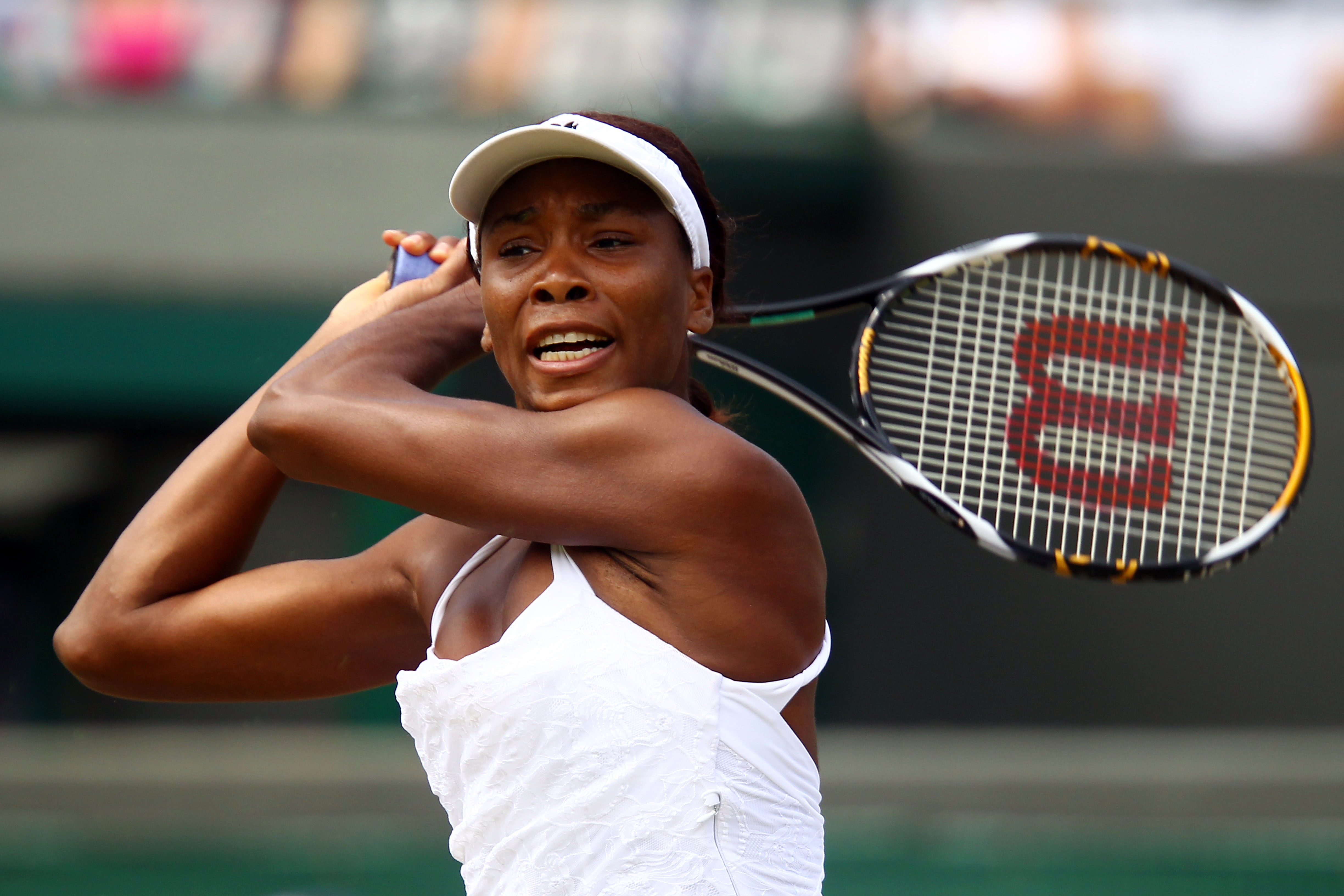 LONDON, ENGLAND - JUNE 29:  Venus Williams of USA in action during her Quarter Final match against Tsvetana Pironkova of Bulgaria on Day Eight of the Wimbledon Lawn Tennis Championships at the All England Lawn Tennis and Croquet Club on June 29, 2010 in L
