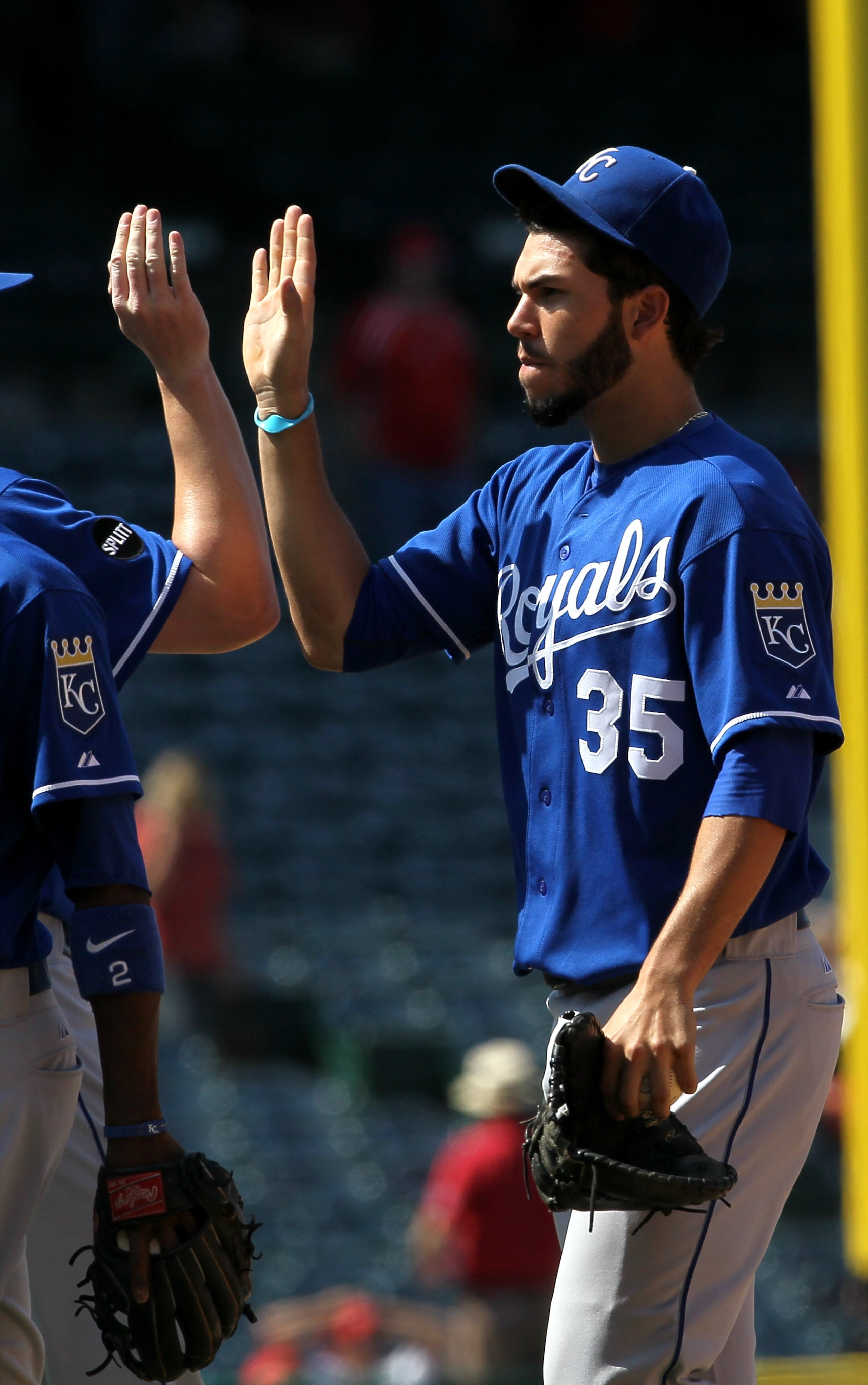 ANAHEIM, CA - JUNE 12:  Eric Hosmer #35 of the Kansas City Royals celebrates with teammates after the game with the Los Angeles Angels of Anaheim on June 12, 2011 at Angel Stadium in Anaheim, California.  The Royals won 9-0.  (Photo by Stephen Dunn/Getty 