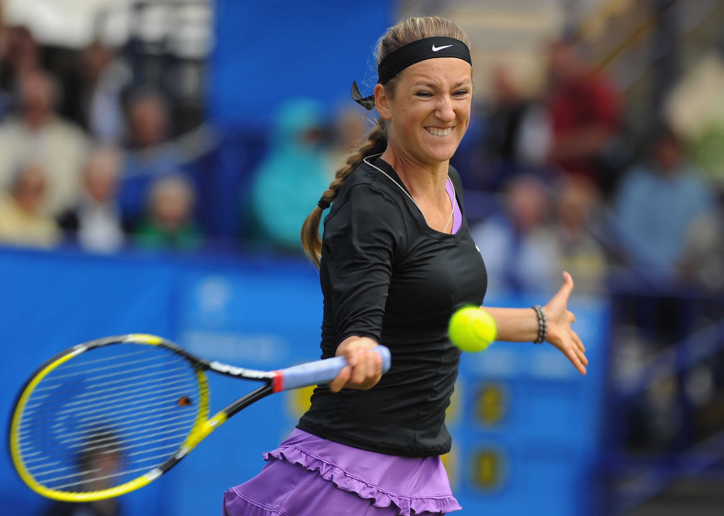 EASTBOURNE, ENGLAND - JUNE 15:  Victoria Azarenka of Belarus in action against Elena Baltacha of Great Britain during day five of the AEGON International at Devonshire Park on June 15, 2011 in Eastbourne, England.  (Photo by Mike Hewitt/Getty Images)