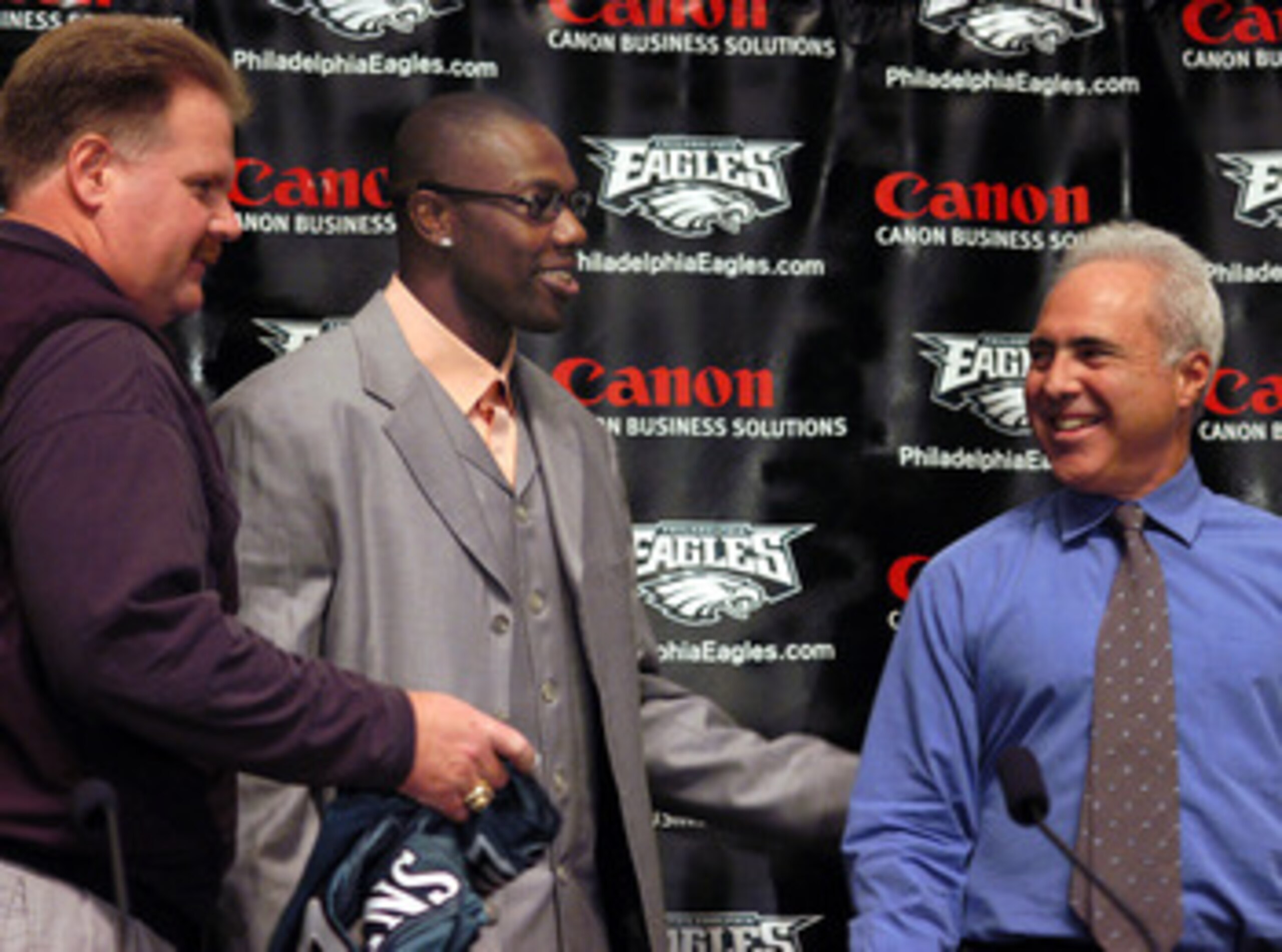 PHILADELPHIA - MARCH 16: (L-R) Philadelphia Eagles head coach Andy Reid, newly acquired Philadelphia Eagles wide receiver Terrell Owens and Philadelphia Eagles owner Jeffrey Lurie share a laugh after a news conference March 16, 2004 in Philadelphia, Penn PHILADELPHIA - MARCH 16: (L-R) Philadelphia Eagles head coach Andy Reid, newly acquired Philadelphia Eagles wide receiver Terrell Owens and Philadelphia Eagles owner Jeffrey Lurie share a laugh after a news conference March 16, 2004 in Philadelphia, Penn