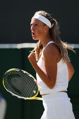 WIMBLEDON, ENGLAND - JUNE 24:  Victoria Azarenka of Belarus reacts during the women's singles second round match against Ioana Olaru of Romania on Day Three of the Wimbledon Lawn Tennis Championships at the All England Lawn Tennis and Croquet Club on June