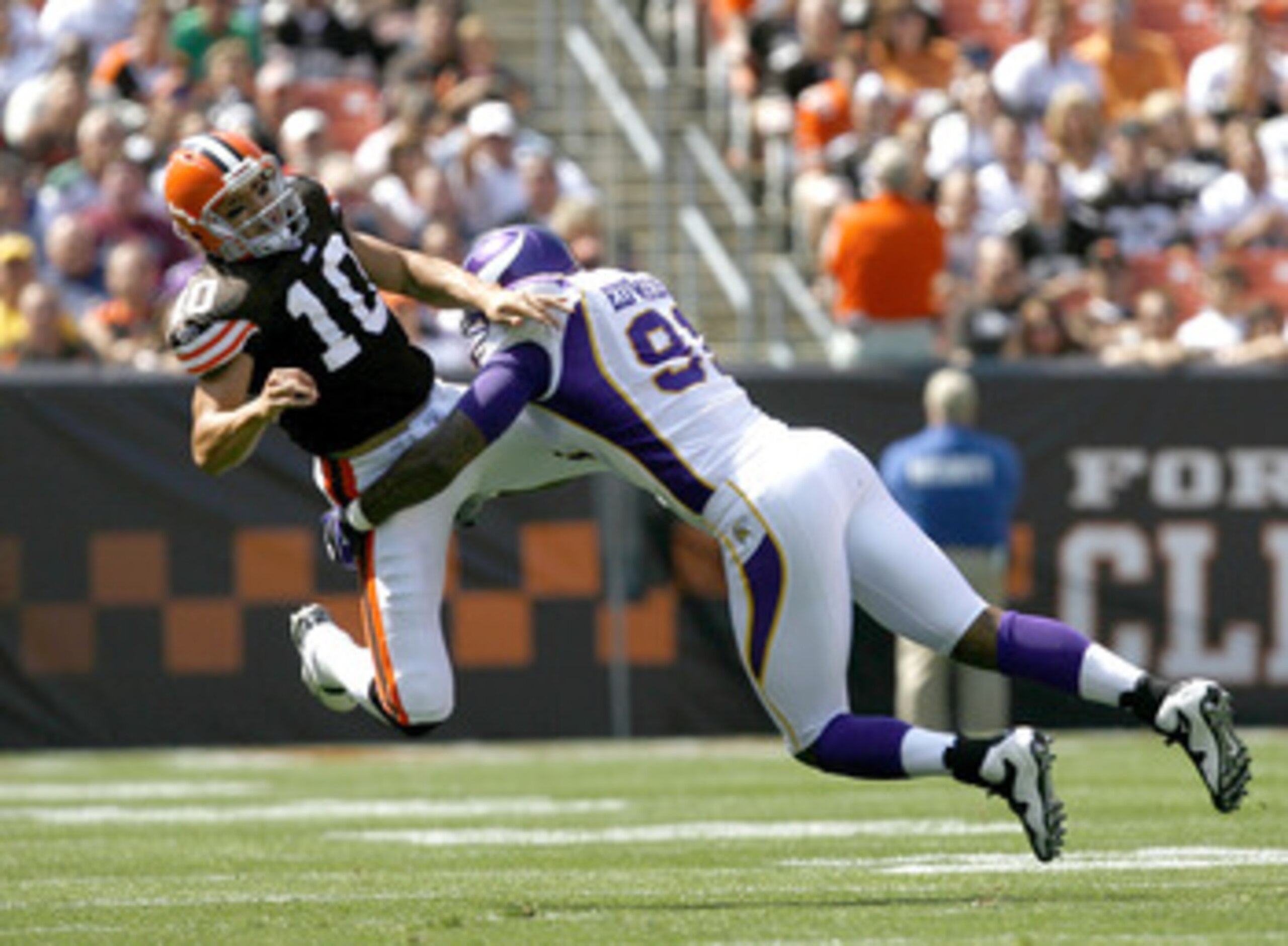CLEVELAND - SEPTEMBER 13:  Ray Edwards #91 of the Minnesota Vikings hits Brady Quinn #10 of the Cleveland Browns at Cleveland Browns Stadium on September 13, 2009 in Cleveland, Ohio.  (Photo by Matt Sullivan/Getty Images)