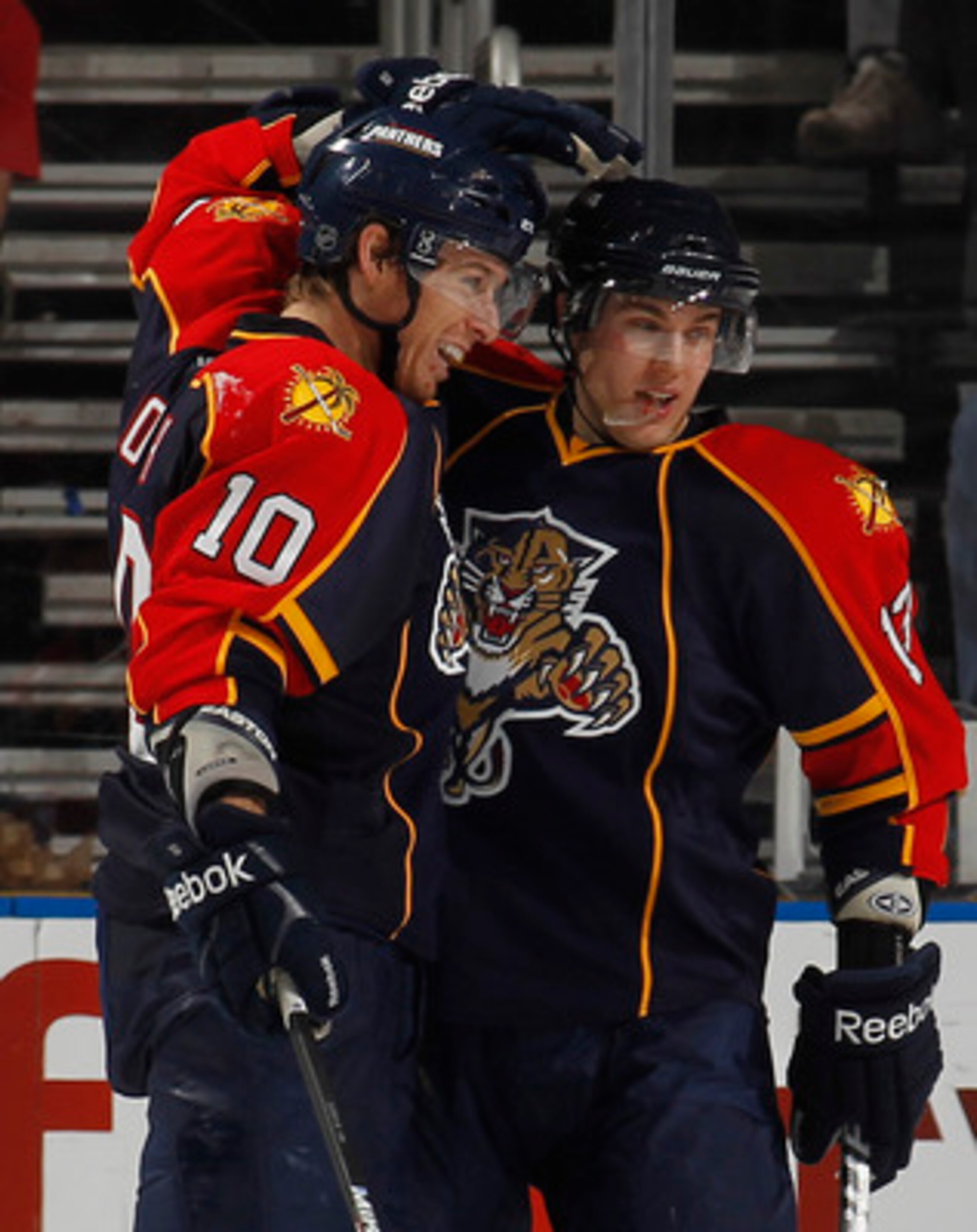 SUNRISE, FL - JANUARY 11: David Booth #10 is congratulated by Michael Santorelli #13 of the Florida Panthers after scoring a second period goal against the Washington Capitals on January 11, 2011 at the BankAtlantic Center in Sunrise, Florida. (Photo by J