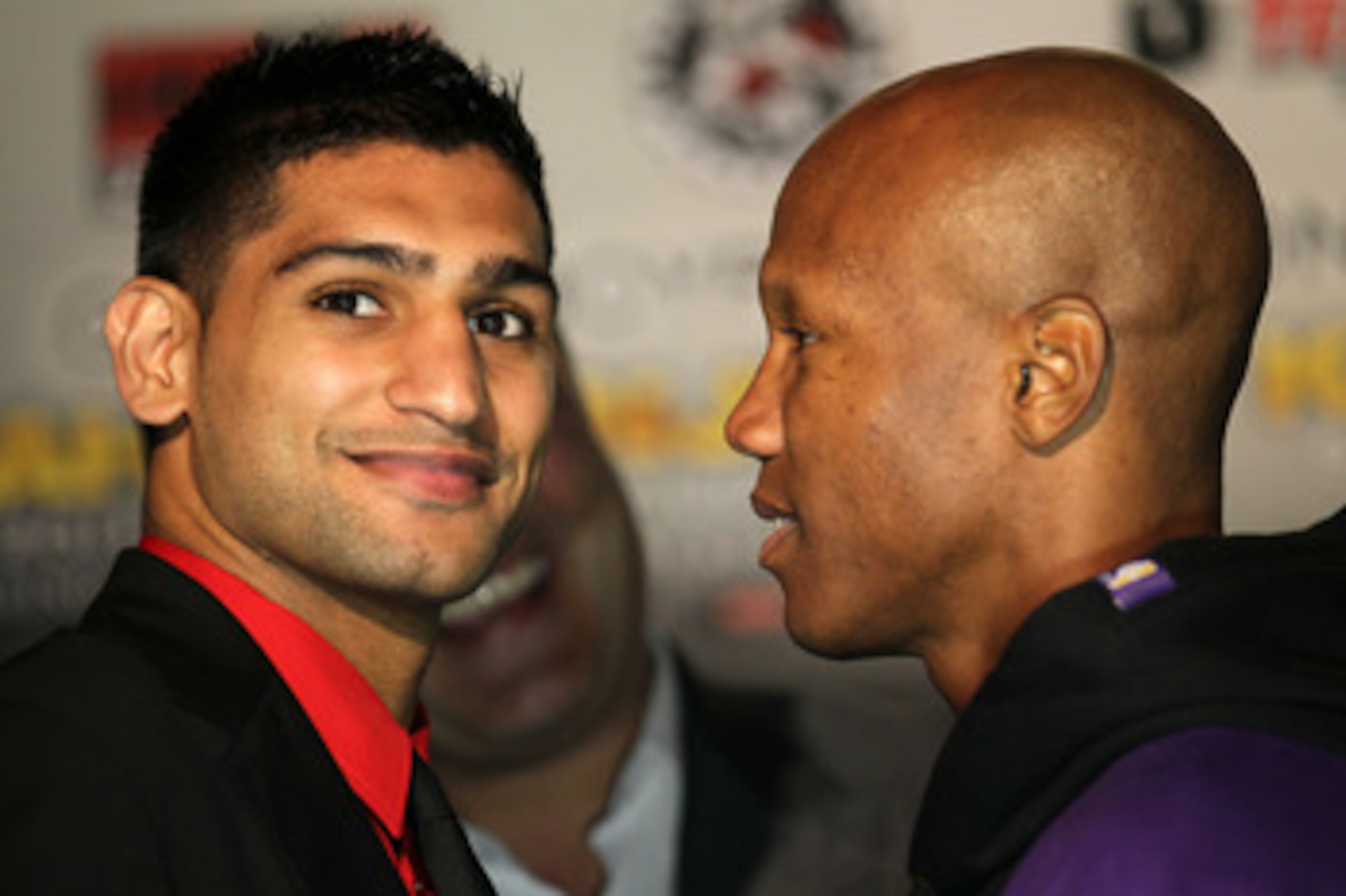 LOS ANGELES, CA - JUNE 08:  Amir Khan (L) and Zab Judah face off at a press conference to discuss their upcoming Super Lightweight World Championship Unification Fight at ESPN Zone At L.A. Live on June 8, 2011 in Los Angeles, California.  (Photo by Stephe