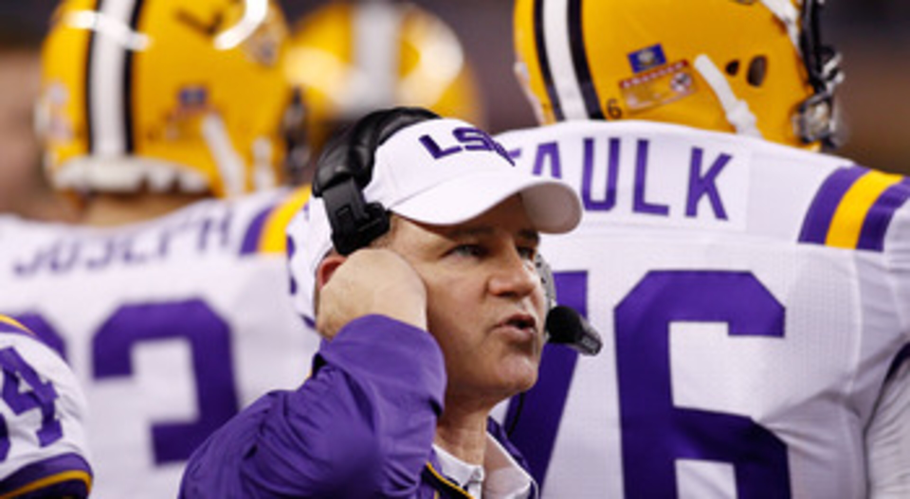 ARLINGTON, TX - JANUARY 07:  Head coach Les Miles of the Louisiana State University Tigers talks wthi his team during a timeout against the Texas A&M Aggies during the AT&T Cotton Bowl at Cowboys Stadium on January 7, 2011 in Arlington, Texas.  (Photo by