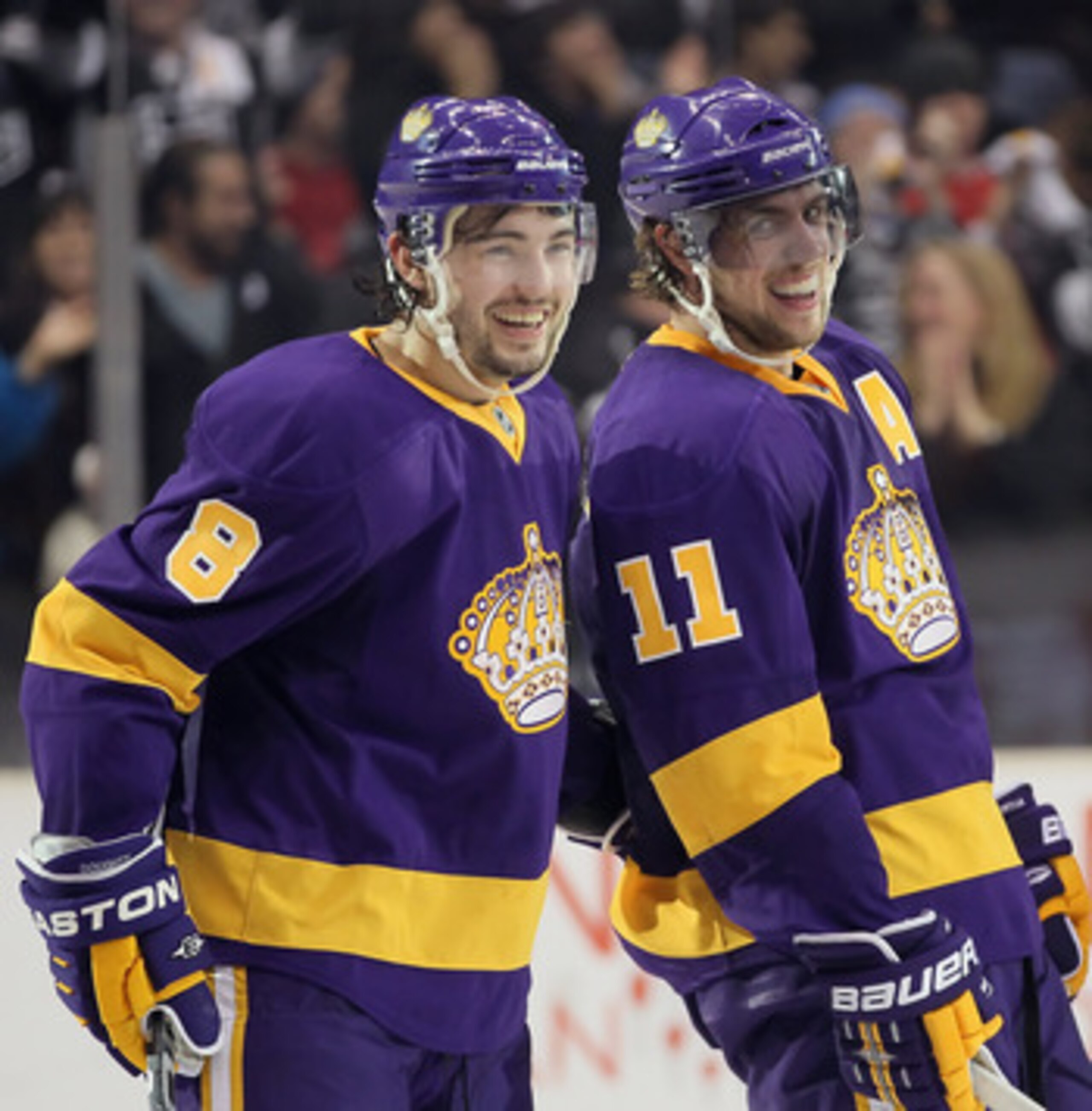 LOS ANGELES, CA - FEBRUARY 24:  Drew Doughty (L) #8 and Anze Kopitar #11 of the Los Angeles Kings celebrate Kopitar's third period goal against the Minnesota Wild at Staples Center on February 24, 2011 in Los Angeles, California. The Kings defeated the Wi