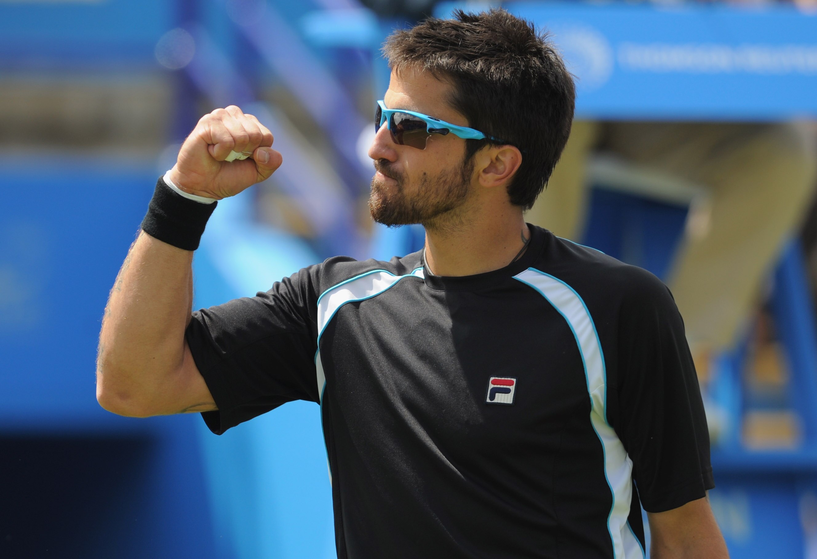 EASTBOURNE, ENGLAND - JUNE 18: Janko Tipsarevic of Serbia celebrates winning his semi final against Kei Nishikoro of Japan during day 8 of the AEGON International tennis tournament on June 18, 2011 in Eastbourne, England.  (Photo by Michael Regan/Getty Im
