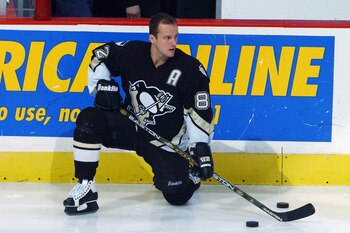 WASHINGTON - APRIL 5:  Left wing Martin Straka #82 of the Pittsburgh Penguins kneels on the ice before the game against the Washington Capitals at MCI Center on April 5, 2003 in Washington, DC.  The Capitals defeated the Penguins 5-3. (Photo By Mitchell L