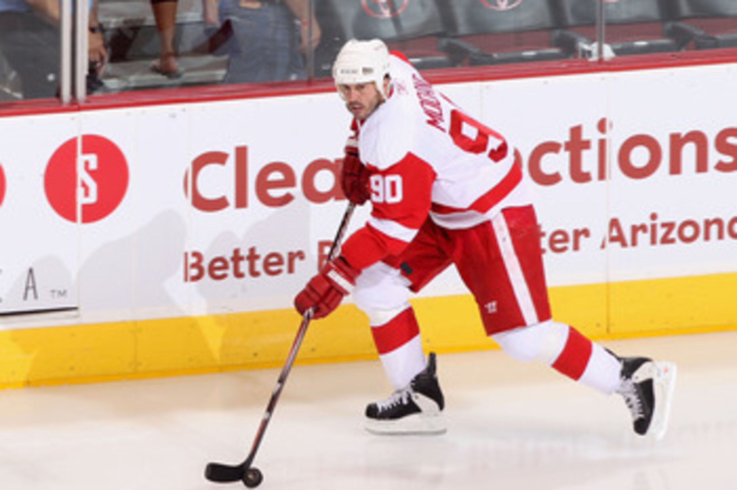 GLENDALE, AZ - APRIL 20:  Mike Modano #90 of the Detroit Red Wings skates with the puck in Game Four of the Western Conference Quarterfinals against the Phoenix Coyotes during the 2011 NHL Stanley Cup Playoffs at Jobing.com Arena on April 20, 2011 in Glen