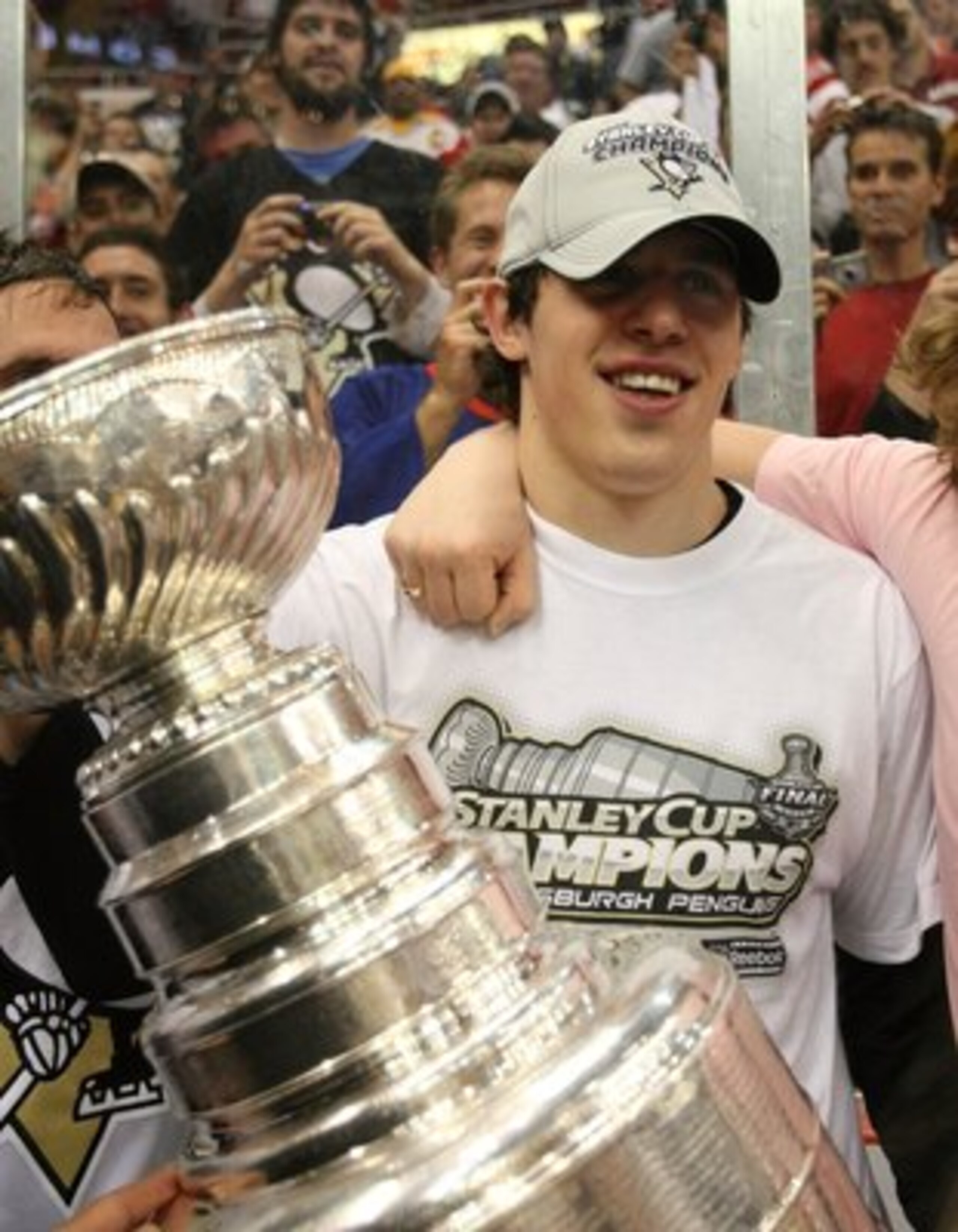 DETROIT - JUNE 12:  Evgeni Malkin #71 of the Pittsburgh Penguins holds the Stanley Cup following the Penguins victory over the Detroit Red Wings in Game Seven of the 2009 NHL Stanley Cup Finals at Joe Louis Arena on June 12, 2009 in Detroit, Michigan.  (P