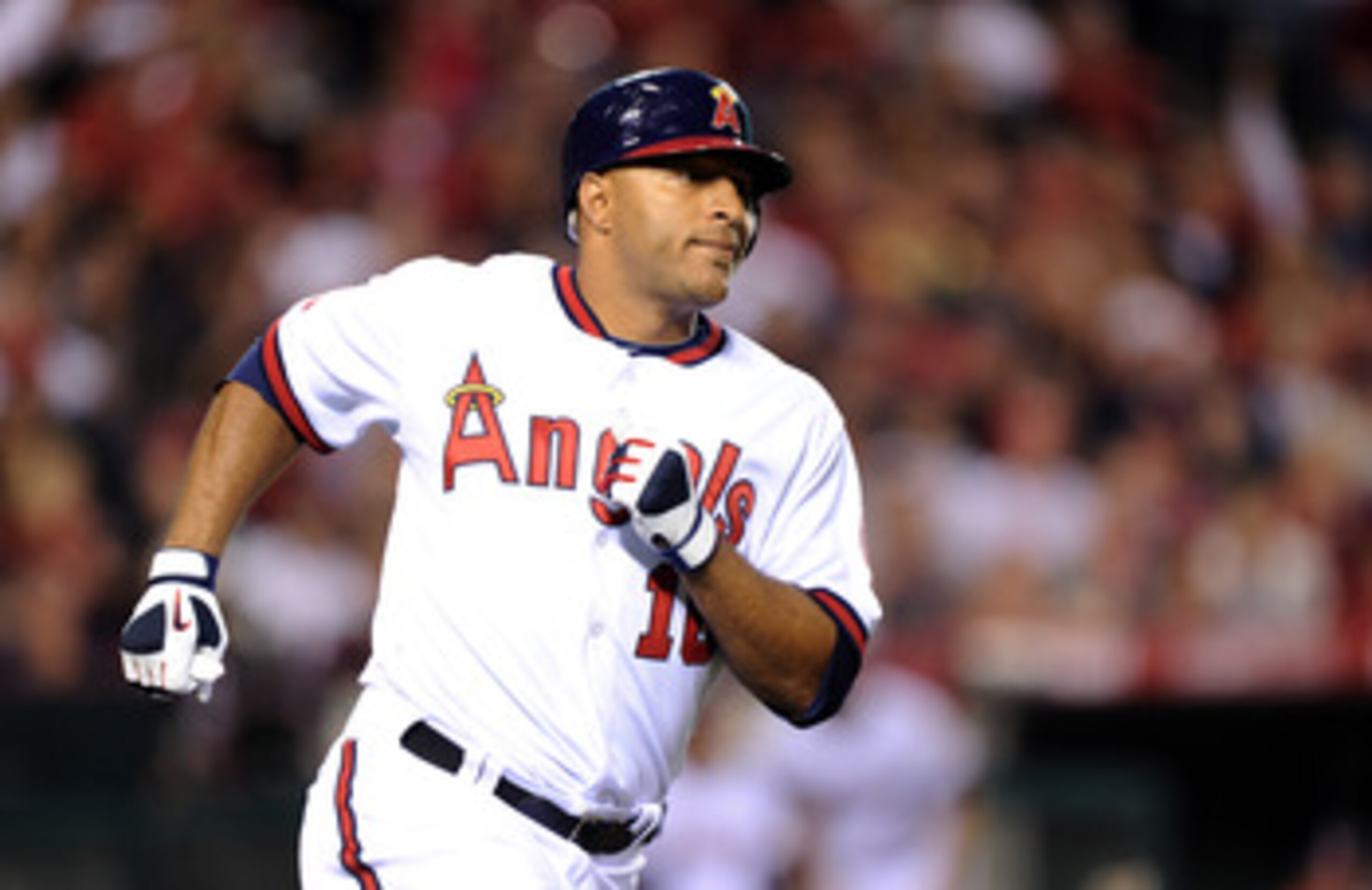 ANAHEIM, CA - APRIL 22:  Vernon Wells #10 of the Los Angeles Angels runs to first base against the Boston Red Sox at Angel Stadium on April 22, 2011 in Anaheim, California.  (Photo by Harry How/Getty Images)