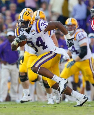 BATON ROUGE, LA - NOVEMBER 20:  Stevan Ridley #34 of the Louisiana State University Tigers against the Ole Miss Rebels at Tiger Stadium on November 20, 2010 in Baton Rouge, Louisiana.  (Photo by Kevin C. Cox/Getty Images)