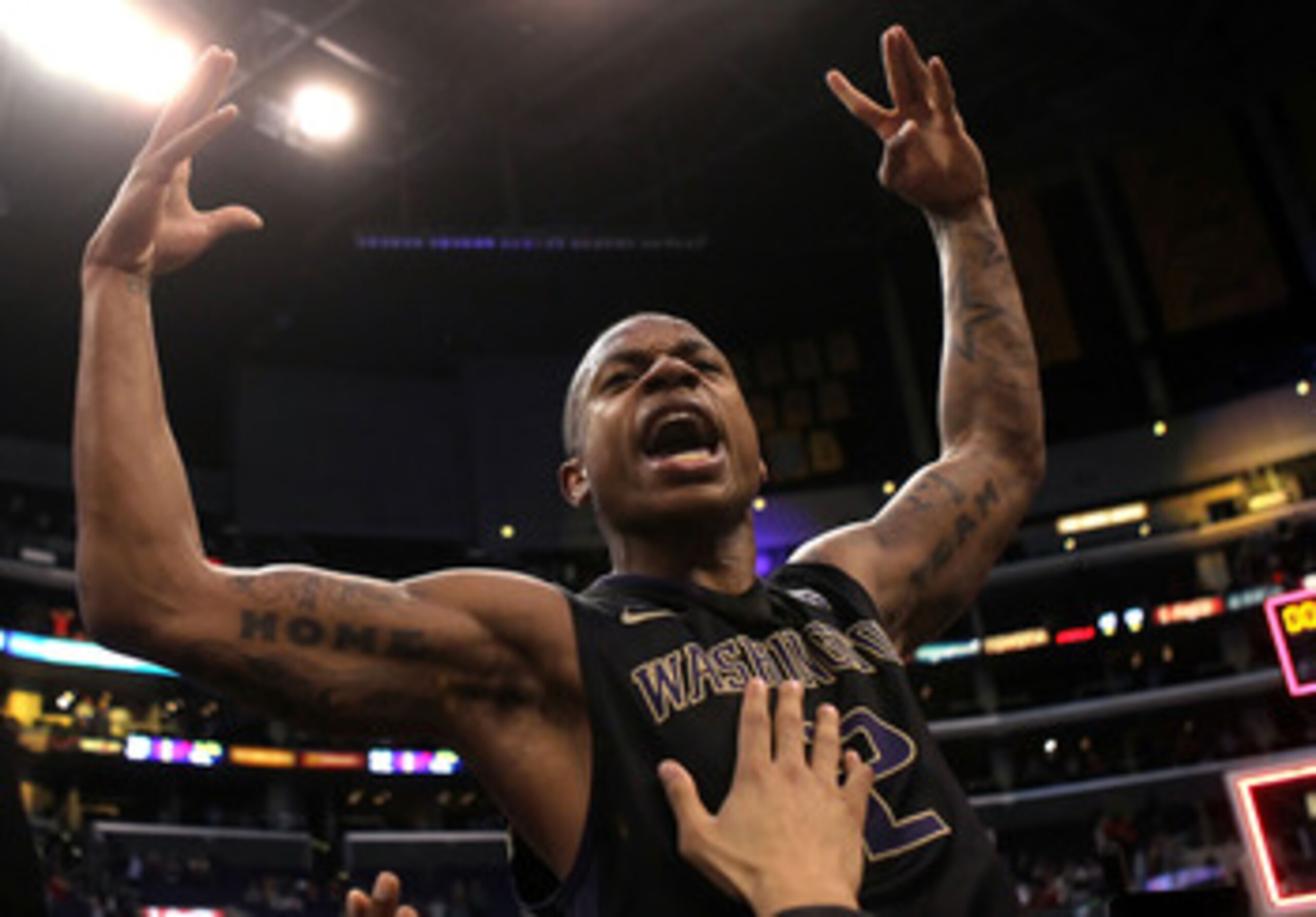 LOS ANGELES, CA - MARCH 12:  Isaiah Thomas #2 of the Washington Huskies reacts after making a last-second shot in overtime to defeat the Arizona Wildcats 77-75 in the championship game of the 2011 Pacific Life Pac-10 Men's Basketball Tournament at Staples