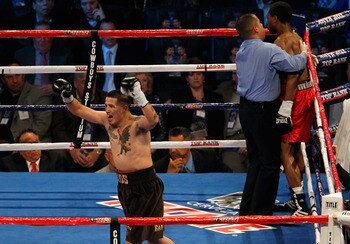 ARLINGTON, TX - NOVEMBER 13:  Brandon Rios (brown trunks) celebrates after he won his match against Omri Lowther during their Super Lightweight bout at Cowboys Stadium on November 13, 2010 in Arlington, Texas.  (Photo by Tom Pennington/Getty Images)