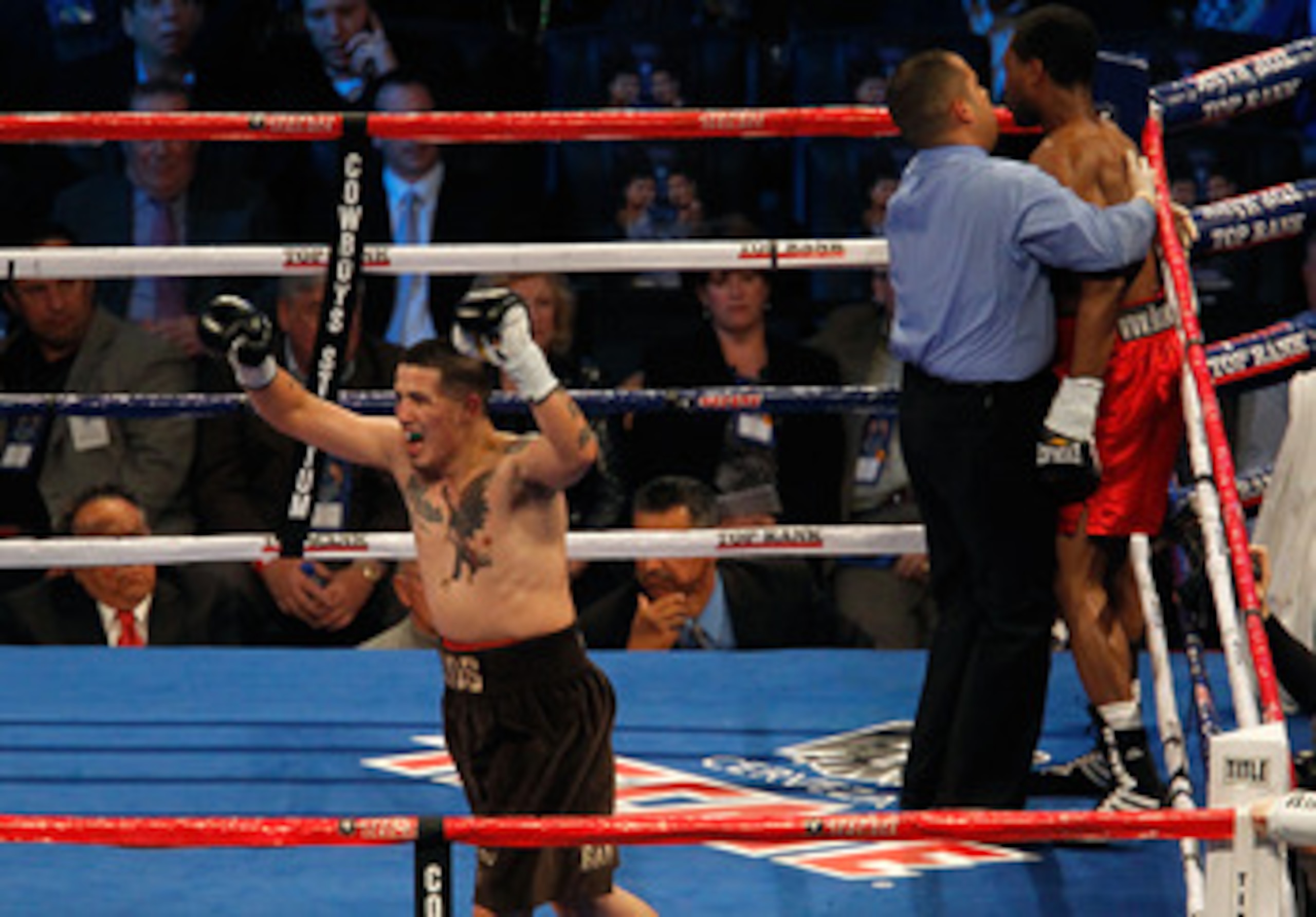 ARLINGTON, TX - NOVEMBER 13:  Brandon Rios (brown trunks) celebrates after he won his match against Omri Lowther during their Super Lightweight bout at Cowboys Stadium on November 13, 2010 in Arlington, Texas.  (Photo by Tom Pennington/Getty Images)