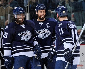 NASHVILLE, TN - MARCH 26: Joel Ward #29 and Shea Weber #6 of the Nashville Predators congratulate teammate David Legwand #11 on scoring an open net goal against the Dallas Stars on March 26, 2011 at the Bridgestone Arena in Nashville, Tennessee. (Photo NASHVILLE, TN - MARCH 26: Joel Ward #29 and Shea Weber #6 of the Nashville Predators congratulate teammate David Legwand #11 on scoring an open net goal against the Dallas Stars on March 26, 2011 at the Bridgestone Arena in Nashville, Tennessee. (Photo
