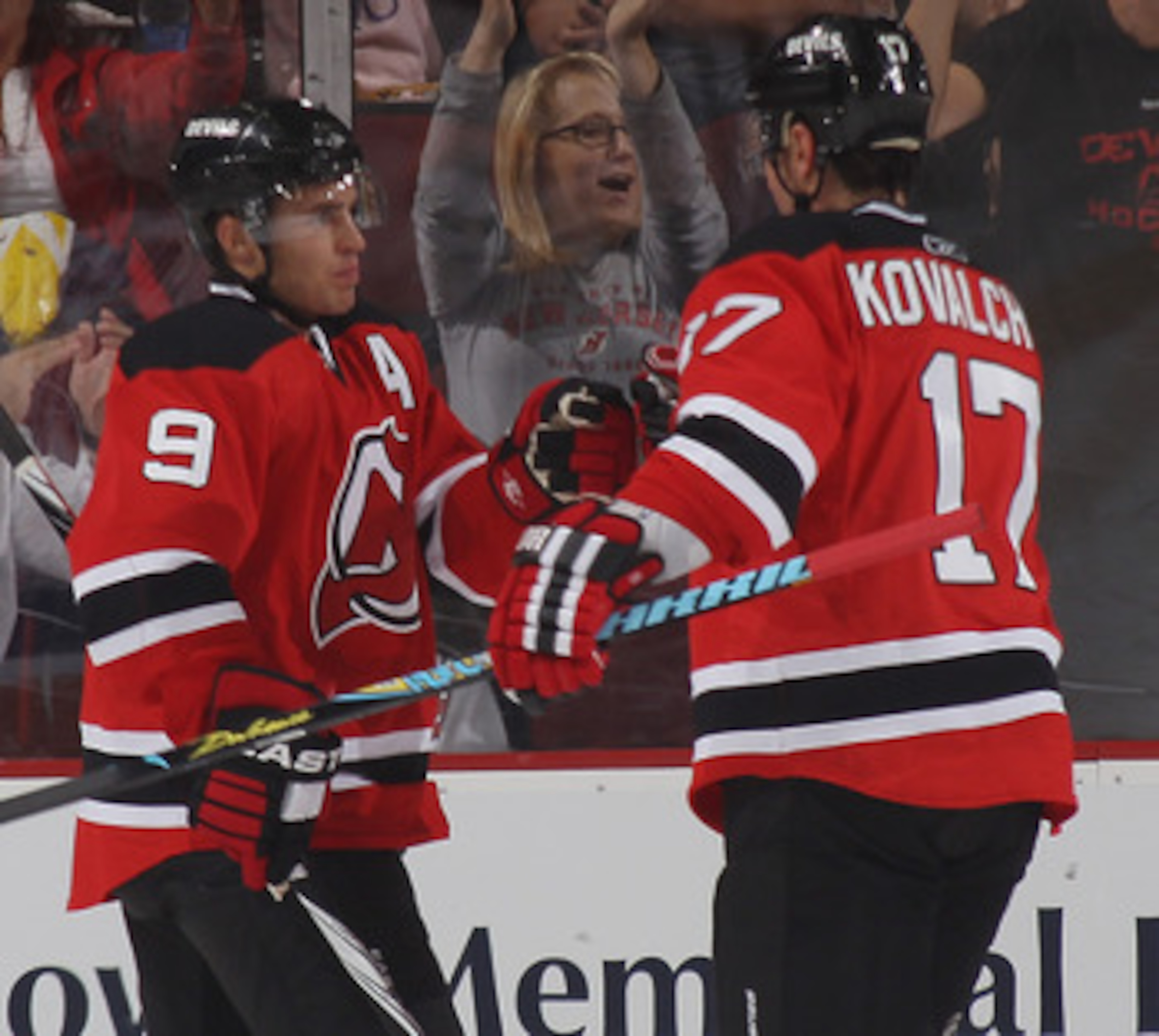 NEWARK, NJ - OCTOBER 01: Zach Parise #9 and Ilya Kovalchuk #17 of the New Jersey Devils celebrate Parise's goal at 14:14 of the first period against the New York Islanders at the Prudential Center on October 1, 2010 in Newark, New Jersey.  (Photo by Bruce