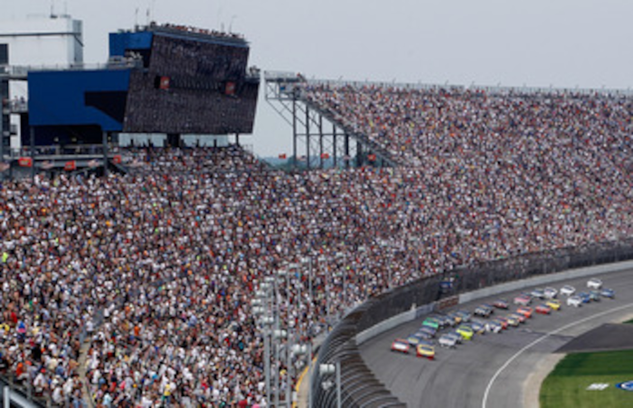 BROOKLYN, MI - JUNE 19:  A view of the field passing the grand stands during the NASCAR Sprint Cup Series Heluva Good! Sour Cream Dips 400 at Michigan International Speedway on June 19, 2011 in Brooklyn, Michigan.  (Photo by Gregory Shamus/Getty Images fo