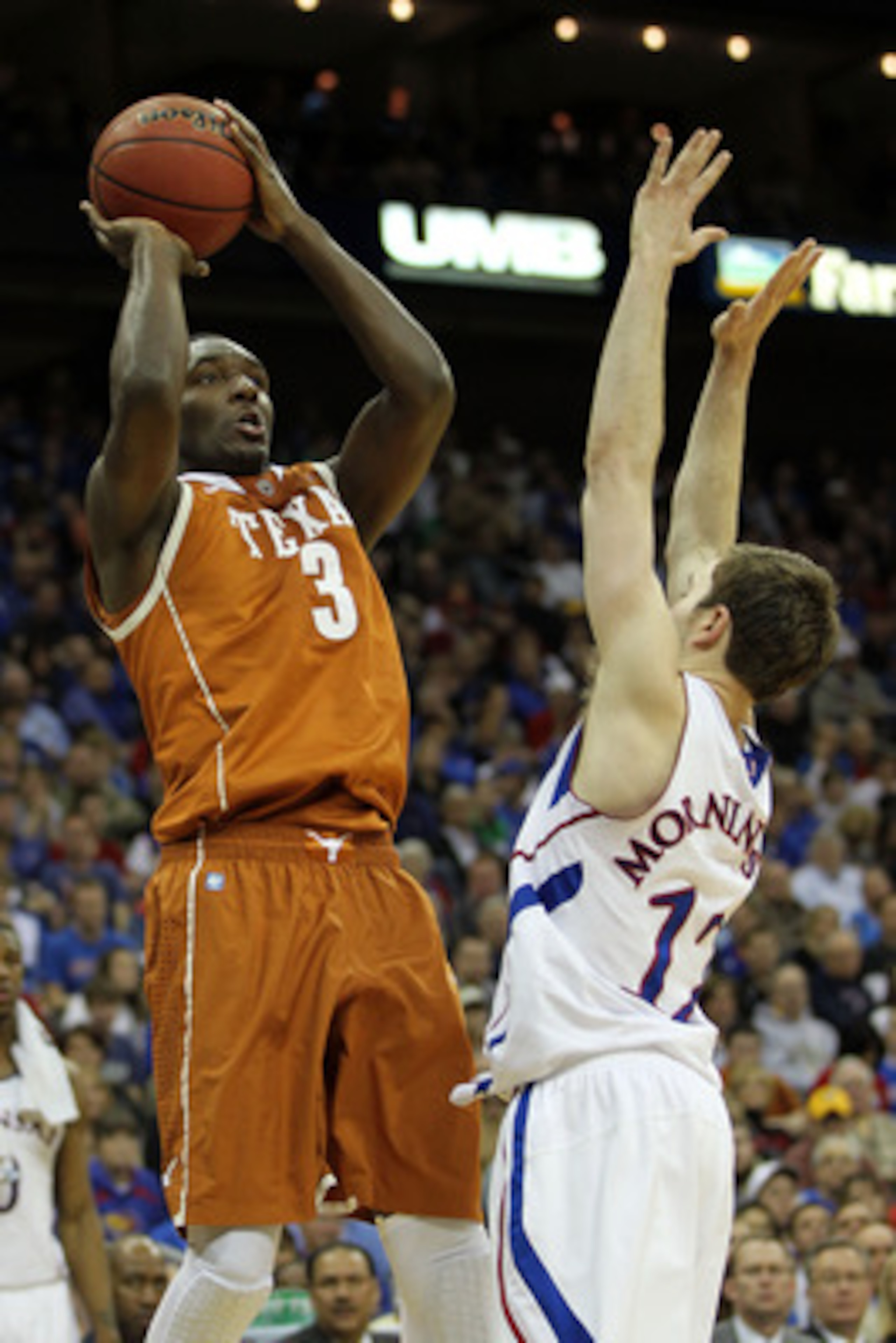 KANSAS CITY, MO - MARCH 12:  Jordan Hamilton #3 of the Texas Longhorns goes up for a shot against Brady Morningstar #12 of the Kansas Jayhawks during the 2011 Phillips 66 Big 12 Men's Basketball Tournament championship game at Sprint Center on March 12, 2