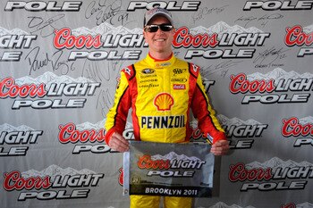 BROOKLYN, MI - JUNE 18: Kurt Busch, driver of the #22 Shell/Pennzoil Dodge, celebrates setting the pole position following qualifying for the NASCAR Sprint Cup Series Heluva Good! Sour Cream Dips 400 at Michigan International Speedway on June 18, 2011 in BROOKLYN, MI - JUNE 18: Kurt Busch, driver of the #22 Shell/Pennzoil Dodge, celebrates setting the pole position following qualifying for the NASCAR Sprint Cup Series Heluva Good! Sour Cream Dips 400 at Michigan International Speedway on June 18, 2011 in