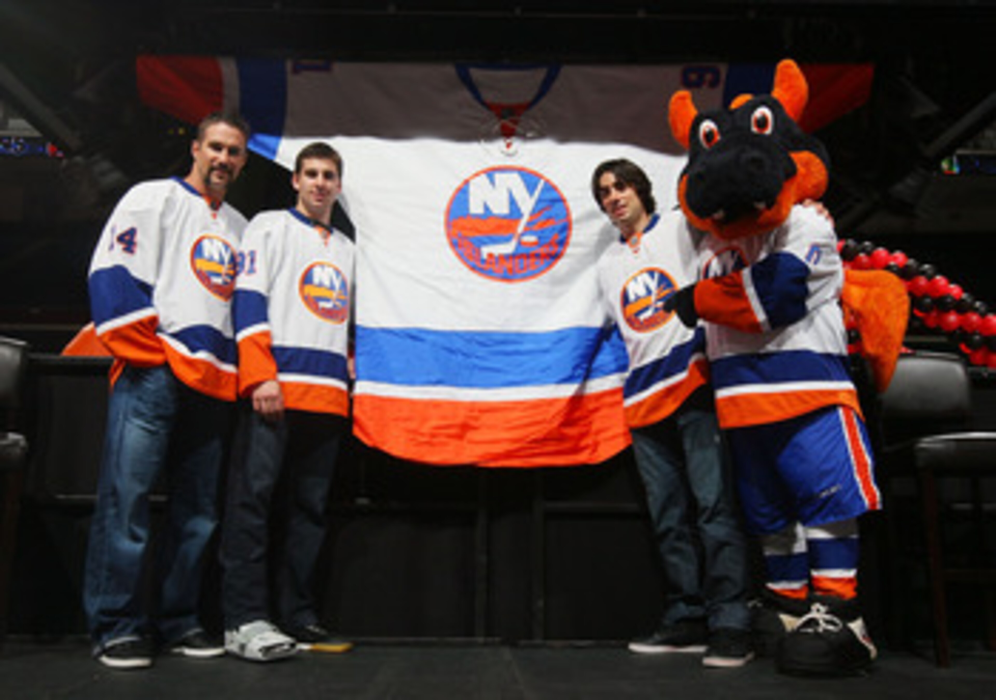 UNIONDALE, NY - JUNE 25:  (L-R) Trevor Gillies, John Tavares, Matt Moulson and Sparky the Dragon pose for a photo wearing their 2010-2011 road jersey's during the New York Islanders Draft Day Party on June 25, 2010 at Nassau Coliseum in Uniondale, New Yor