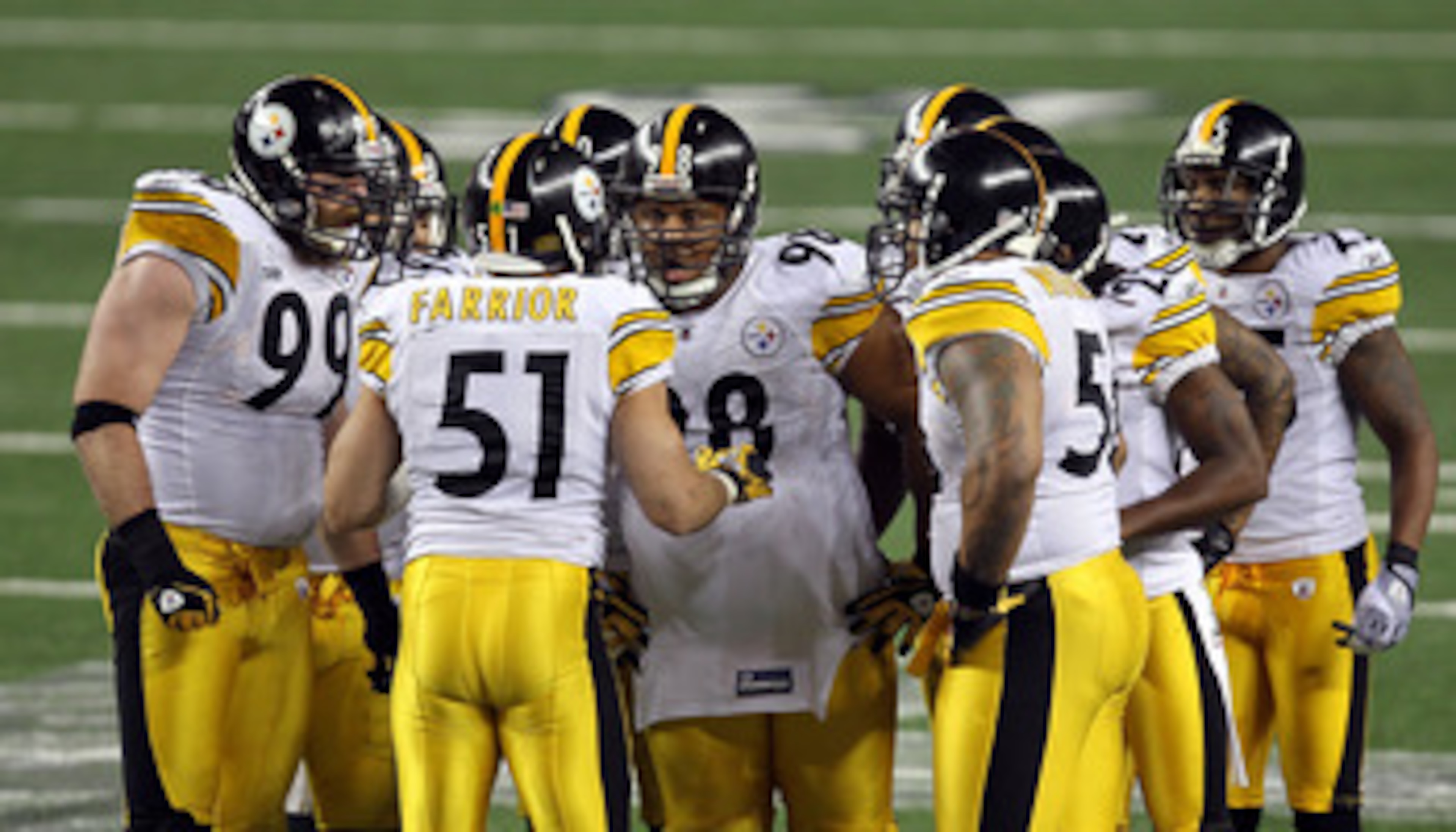 ARLINGTON, TX - FEBRUARY 06: James Farrior #51 of the Pittsburgh Steelers calls a play in the defensive huddle as Brett Keisel #99 and Casey Hampton #98 (c) look on against the Green Bay Packers during Super Bowl XLV at Cowboys Stadium on February 6, 201 ARLINGTON, TX - FEBRUARY 06: James Farrior #51 of the Pittsburgh Steelers calls a play in the defensive huddle as Brett Keisel #99 and Casey Hampton #98 (c) look on against the Green Bay Packers during Super Bowl XLV at Cowboys Stadium on February 6, 201