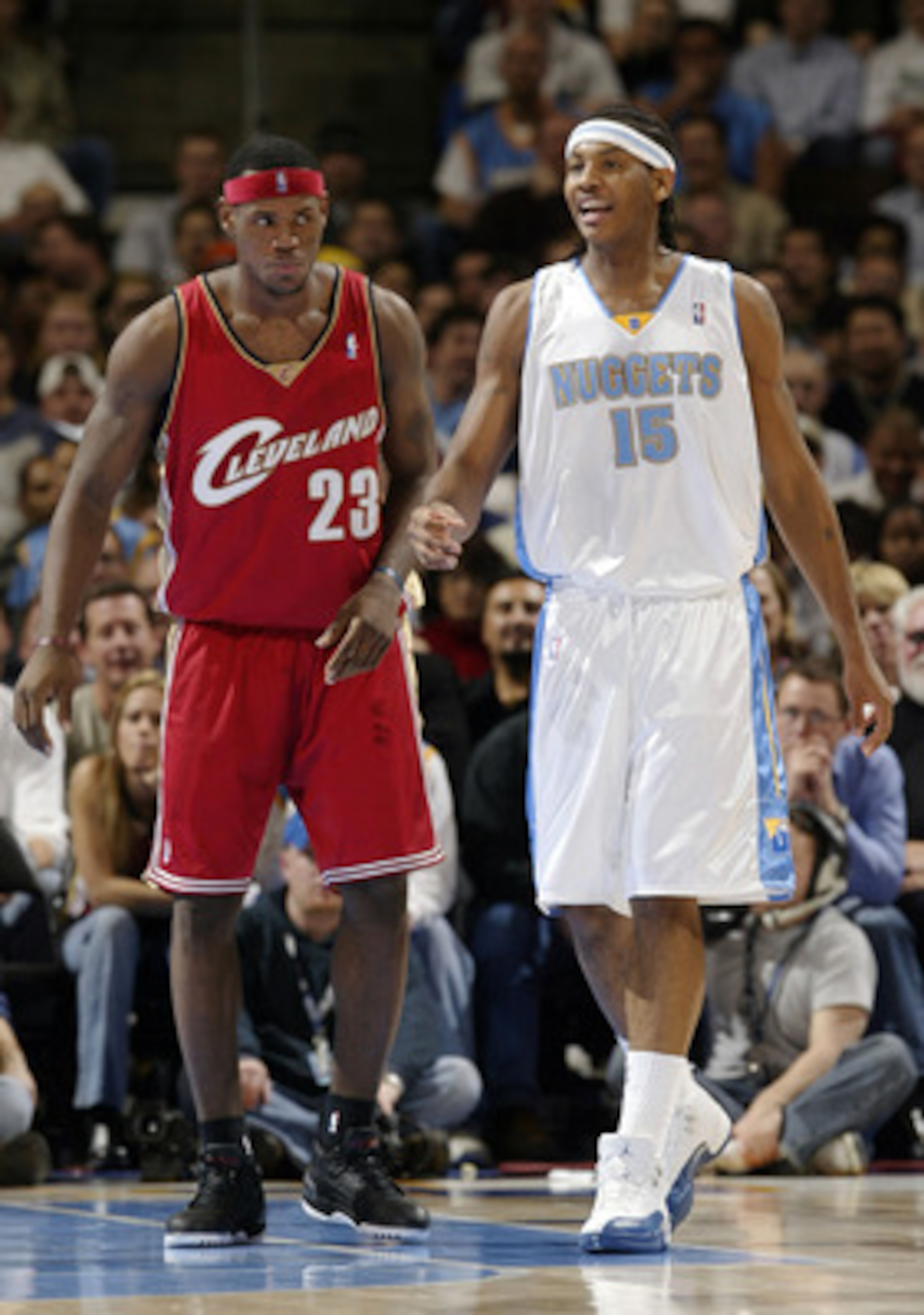 DENVER - DECEMBER 2:  Carmelo Anthony #15 of the Denver Nuggets and LeBron James #23 of the Clevelenad Cavaliers cover each other during the fourth quarter December 2, 2003 at the Pepsi Center in Denver, Colorado.  Anthony had 26 points; James 19, in the