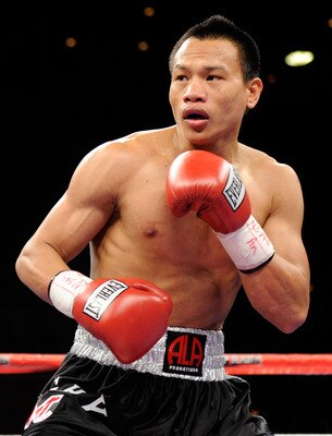 LAS VEGAS, NV - FEBRUARY 19:  Mark Melligen of the Philippines fights Gabriel Martinez of Mexico during the first round of their welterweight bout at the Mandalay Bay Events Center February 19, 2011 in Las Vegas, Nevada. Melligen won by unanimous decision