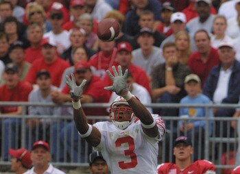 COLUMBUS, OH - OCTOBER 13:  Wide receiver Lee Evans #3 of the Wisconsin Badgers stretches for a catch over safety Mike Doss #2 of the Ohio State Buckeyes during the Big Ten Conference football game on October 13,2001 at the Ohio Stadium in Columbus, Ohio.