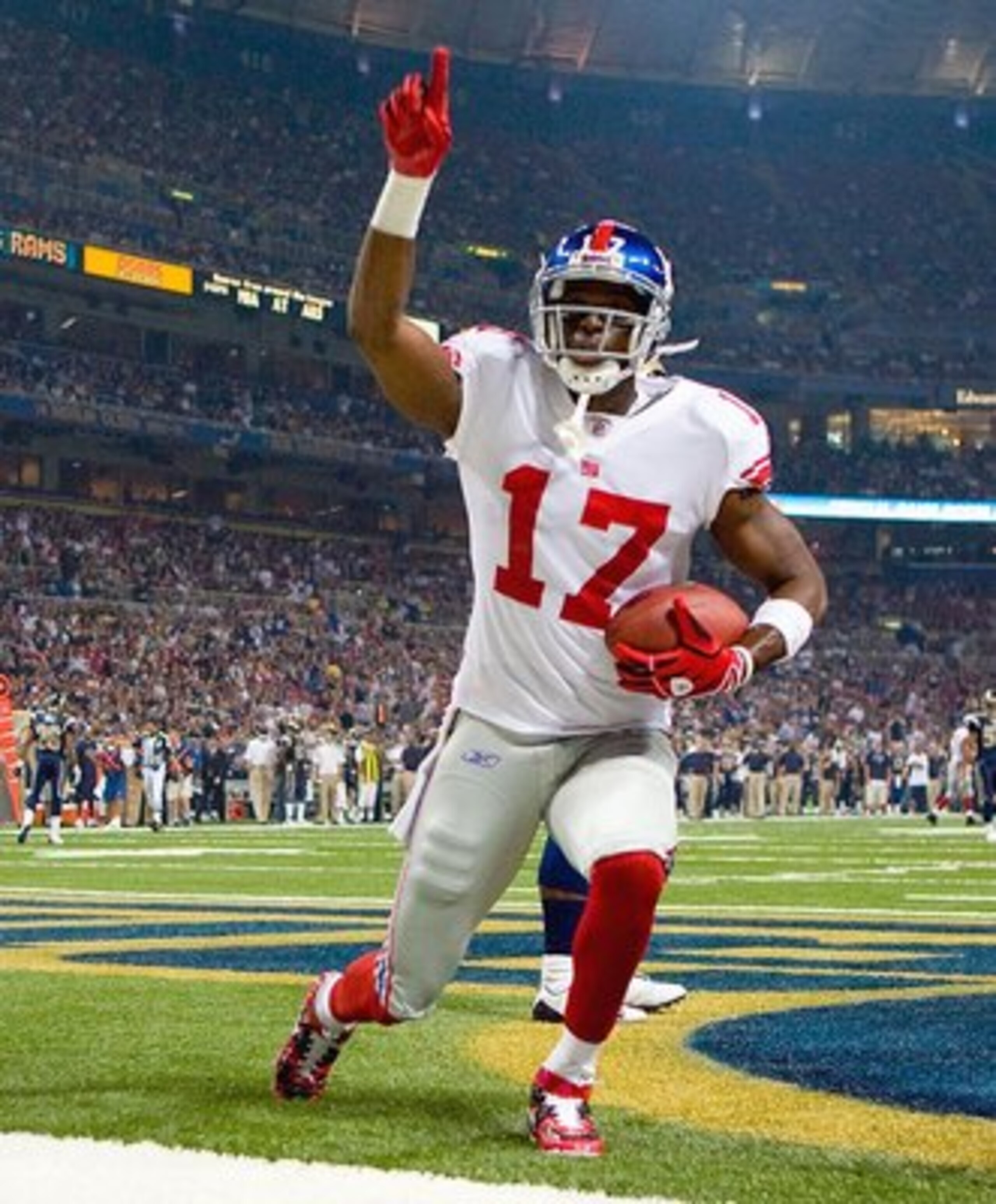 ST. LOUIS, MO - SEPTEMBER 14: Plaxico Buress #17 of the New York Giants celebrates a touchdown against the St. Louis Rams at the Edward Jones Dome on September 14, 2008 in St. Louis, Missouri. (Photo by Dilip Vishwanat/Getty Images)