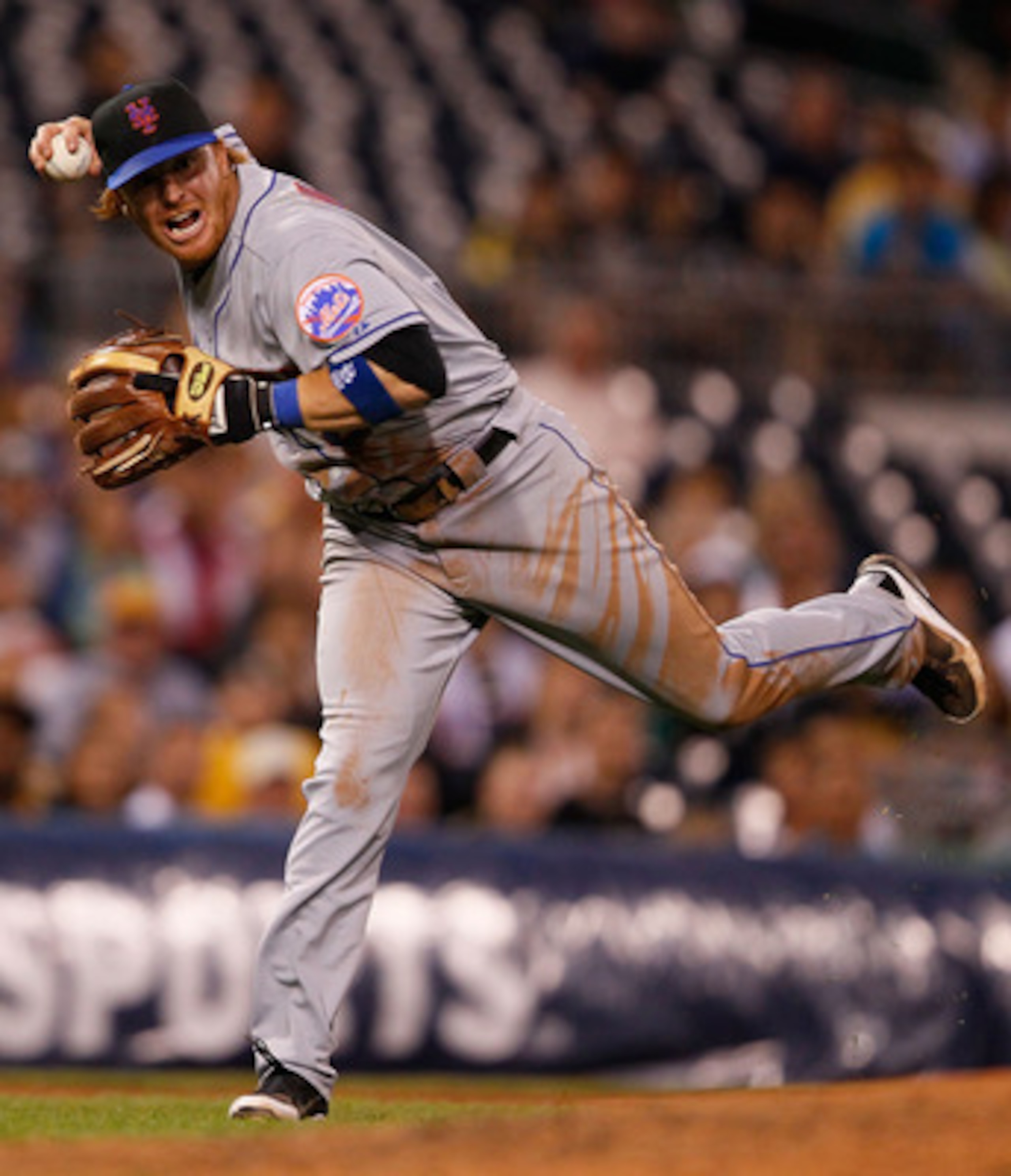 PITTSBURGH - JUNE 13:  Justin Turner #2 of the New York Mets throws to first base against the Pittsburgh Pirates  during the game on June 13, 2011 at PNC Park in Pittsburgh, Pennsylvania.  (Photo by Jared Wickerham/Getty Images)