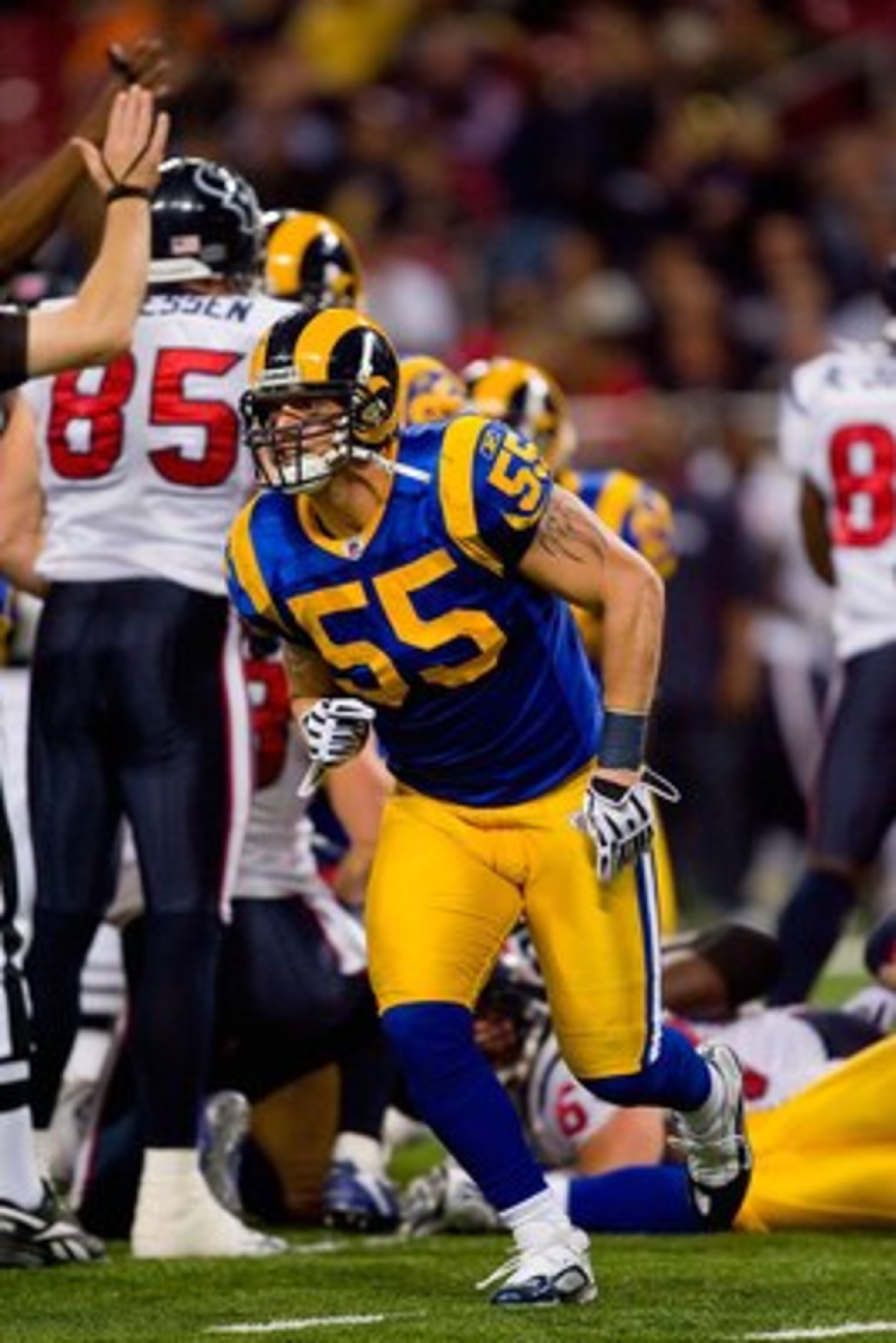 ST. LOUIS - DECEMBER 20:  James Laurinaitis #59 of the St. Louis Rams reacts to a play during the game against the Houston Texans at Edward Jones Dome on December 20, 2009 in St. Louis, Missouri.  (Photo by Dilip Vishwanat/Getty Images)