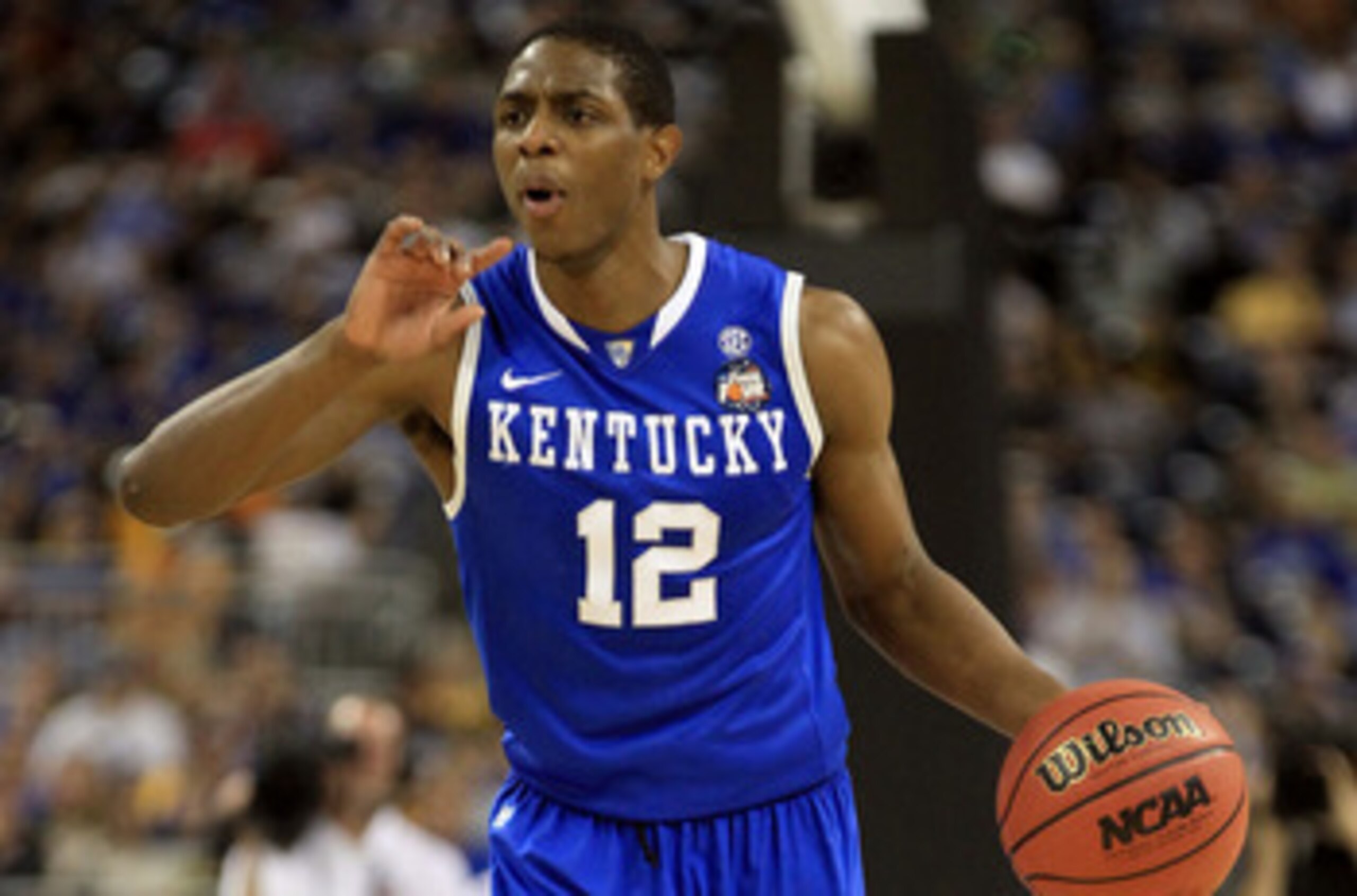 HOUSTON, TX - APRIL 02:  Brandon Knight #12 of the Kentucky Wildcats moves the ball while taking on the Connecticut Huskies during the National Semifinal game of the 2011 NCAA Division I Men's Basketball Championship at Reliant Stadium on April 2, 2011 in