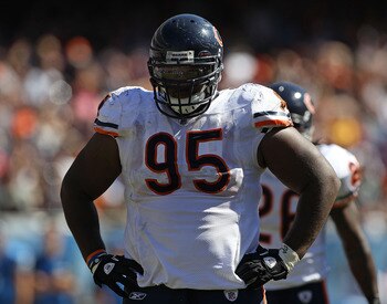 CHICAGO - SEPTEMBER 12: Anthony Adams #95 of the Chicago Bears awaits the start of play against the Detroit Lions during the NFL season opening game at Soldier Field on September 12, 2010 in Chicago, Illinois. The Bears defeated the Lions 19-14.  (Photo b