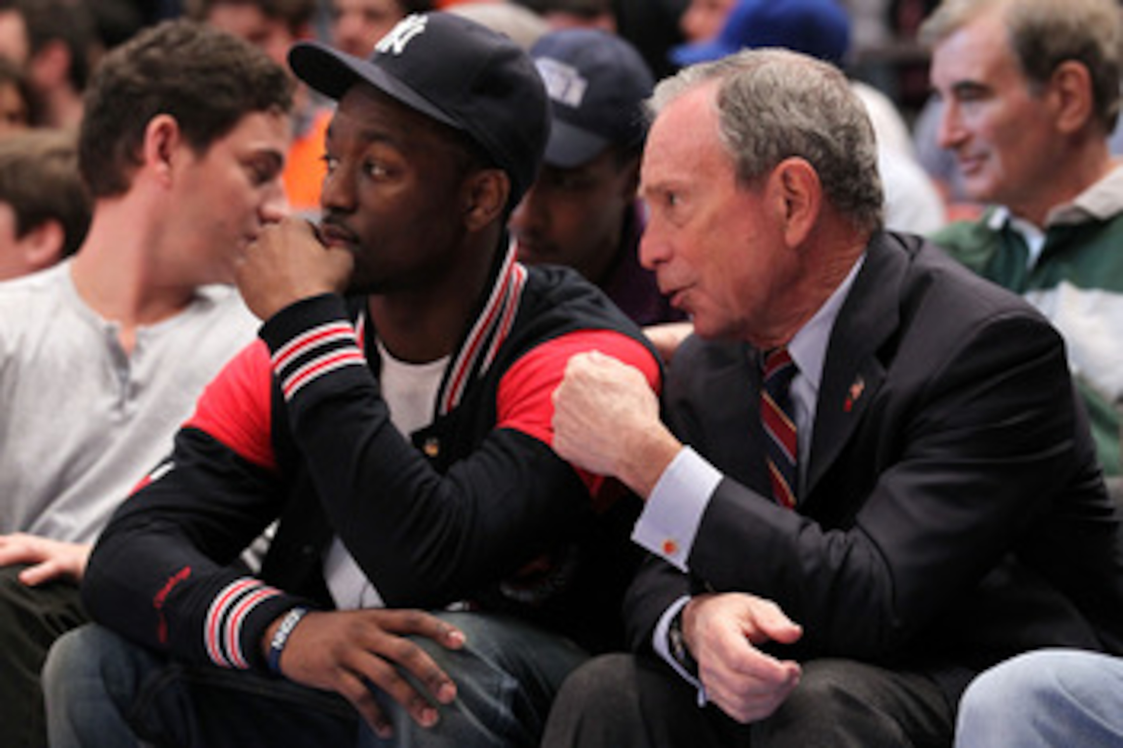 NEW YORK, NY - APRIL 24:  NBA draft prospect Kemba Walker (L) from the University of Connecticut Huskies and New York City Mayor Michael Bloomberg watch the New York Knicks play against the Boston Celtics in Game Four of the Eastern Conference Quarterfina