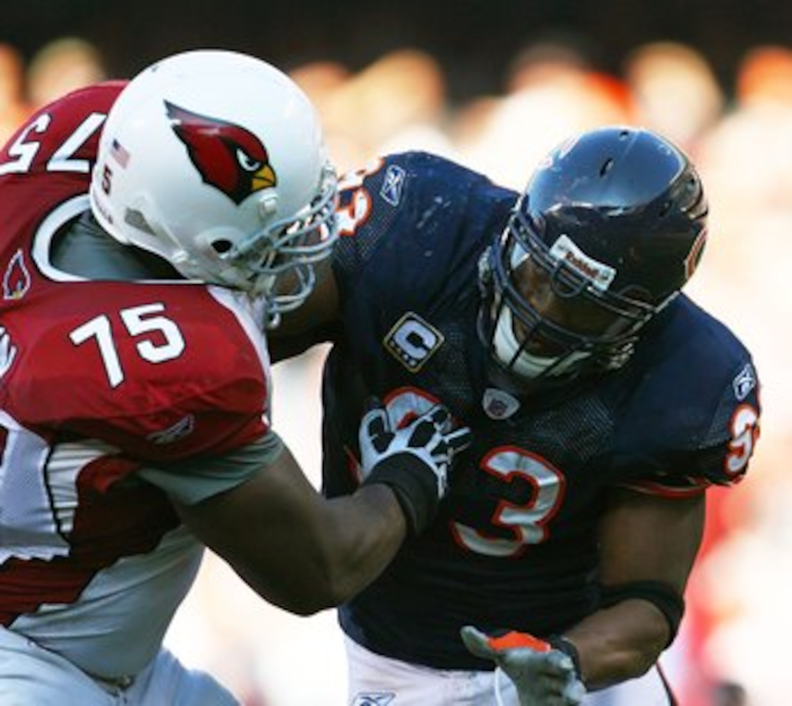 CHICAGO - NOVEMBER 08: Adewale Ogunleye #93 of the Chicago Bears rushes against Levi Brown #75 of the Arizona Cardinals at Soldier Field on November 8, 2009 in Chicago, Illinois. The Cardinals defeated the Bears 41-21. (Photo by Jonathan Daniel/Getty Imag CHICAGO - NOVEMBER 08: Adewale Ogunleye #93 of the Chicago Bears rushes against Levi Brown #75 of the Arizona Cardinals at Soldier Field on November 8, 2009 in Chicago, Illinois. The Cardinals defeated the Bears 41-21. (Photo by Jonathan Daniel/Getty Imag