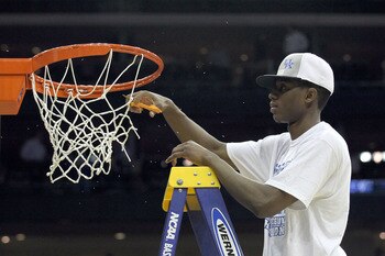 NEWARK, NJ - MARCH 27:  MVP Brandon Knight #12 of the Kentucky Wildcats cuts the net after defeating the North Carolina Tar Heels in the east regional final of the 2011 NCAA men's basketball tournament at Prudential Center on March 27, 2011 in Newark, New