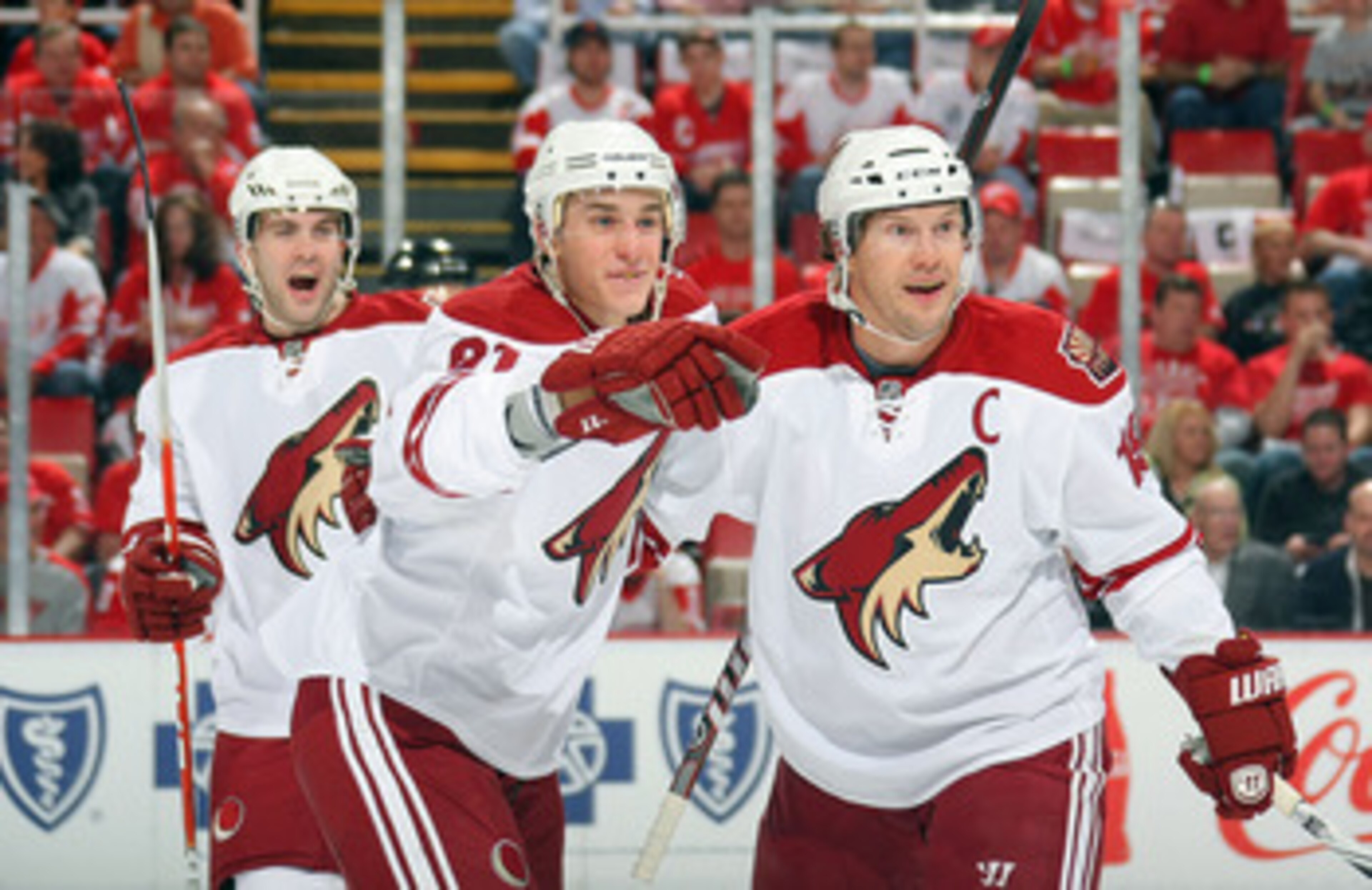 DETROIT, MI - APRIL 13:  Kyle Turris #91 of the Phoenix Coyotes celebrates his first period goal with teammates Shane Doan #19 and Keith Yandle #3 as they play the Detroit Red Wings in Game One of the Western Conference Quarterfinals during the 2011 NHL S