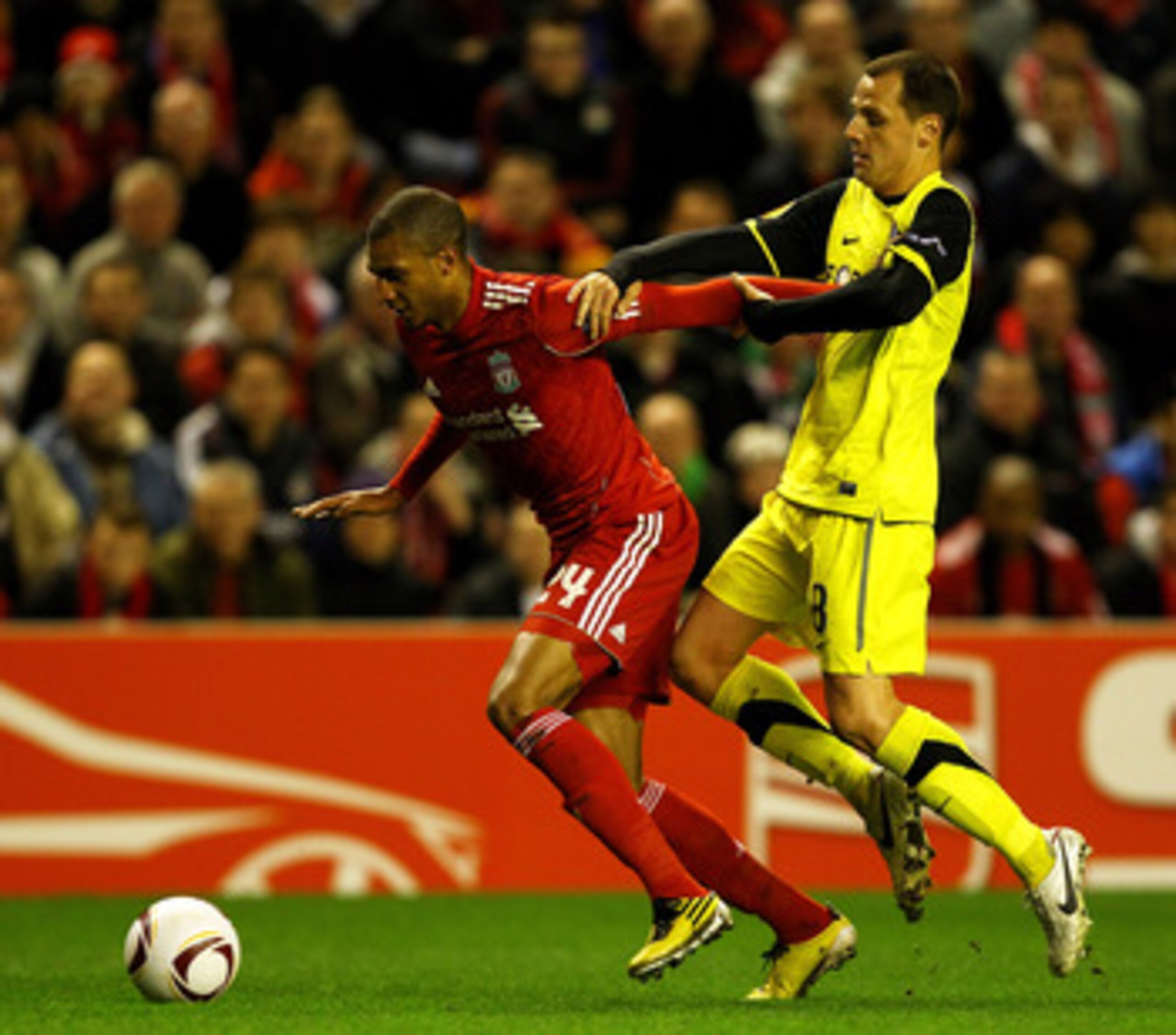LIVERPOOL, ENGLAND - FEBRUARY 24:  Marek Matejovsky of Sparta Prague challenges David Ngog of Liverpool during the UEFA Europa League Round of 32 2nd leg match beteween Liverpool and Sparta Prague at Anfield on February 24, 2011 in Liverpool, England.  (P