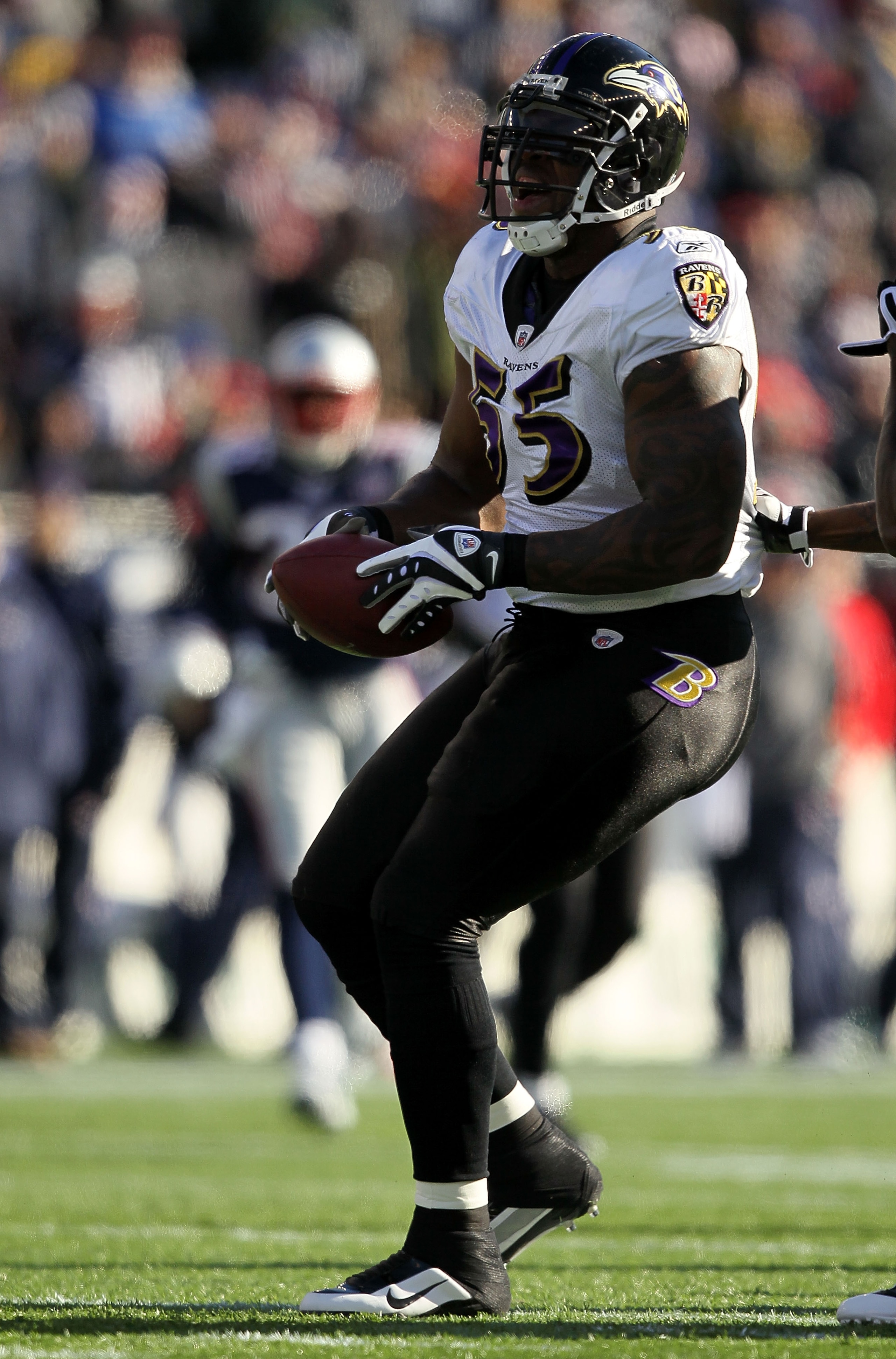 FOXBORO, MA - JANUARY 10:  Terrell Suggs #55 of the Baltimore Ravens reacts after he recovered a fumble in the first quarter against the New England Patriots during the 2010 AFC wild-card playoff game at Gillette Stadium on January 10, 2010 in Foxboro, Ma