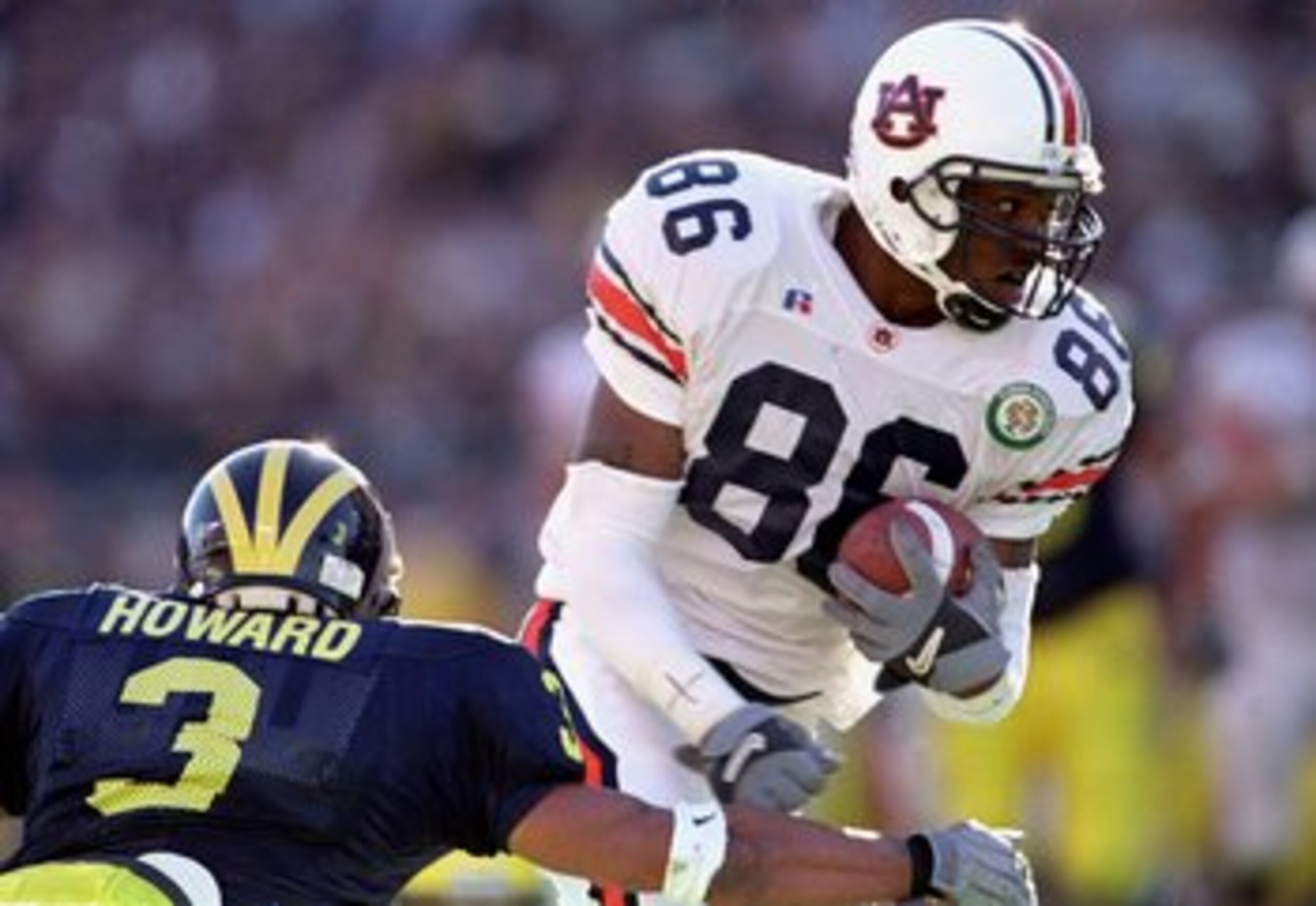 1 Jan 2001:   Deandre Green #89 of the Auburn Tigers carries the ball as he avoids the tackle during the Citrus Bowl Game against the Michigan Wolverines at the Citrus Bowl in Orlando, Florida.  The Wolverines defeated the Tiger 31-28.Mandatory Credit: An